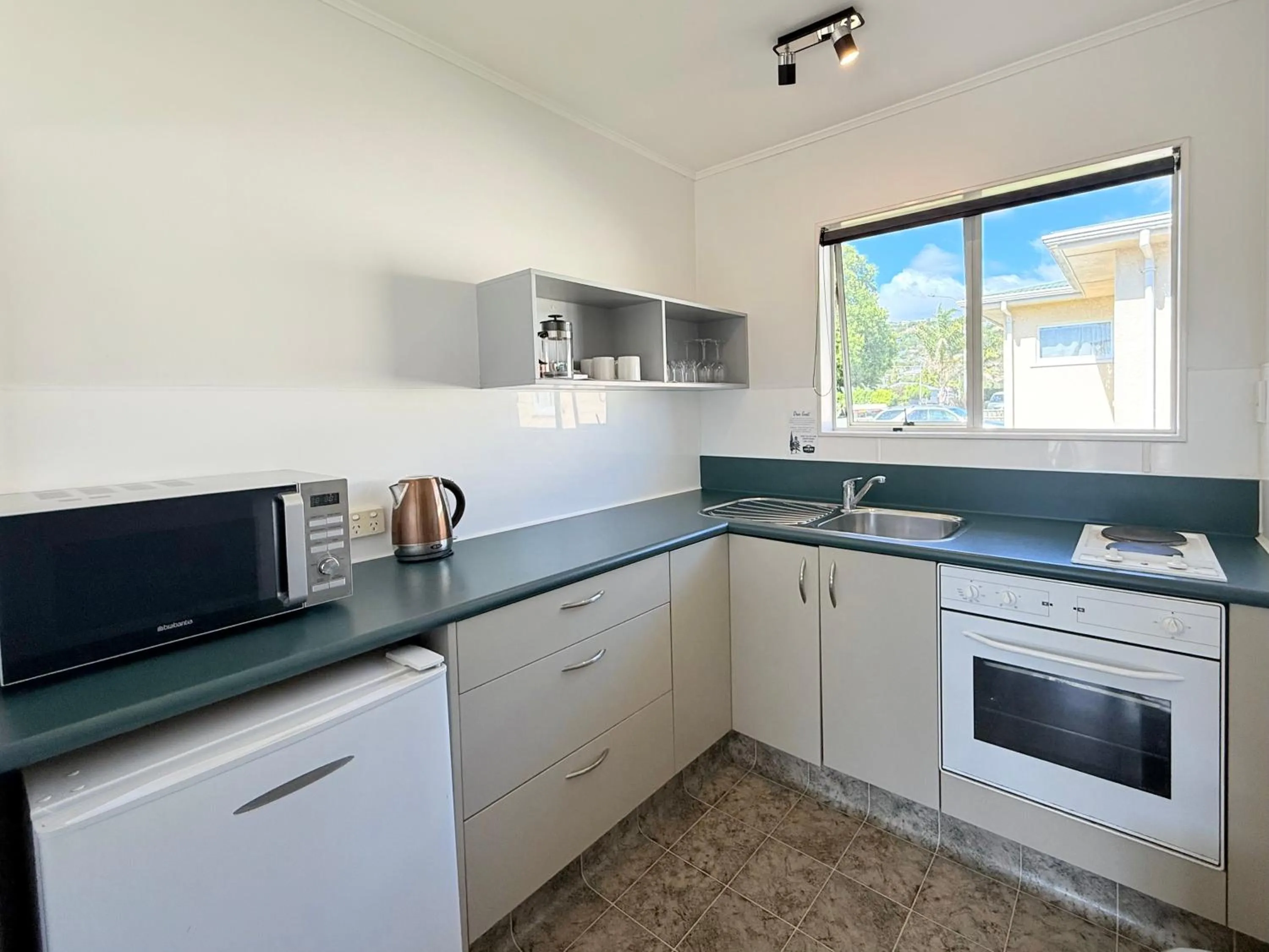 Kitchen or kitchenette in ASURE Fountain Resort Motel
