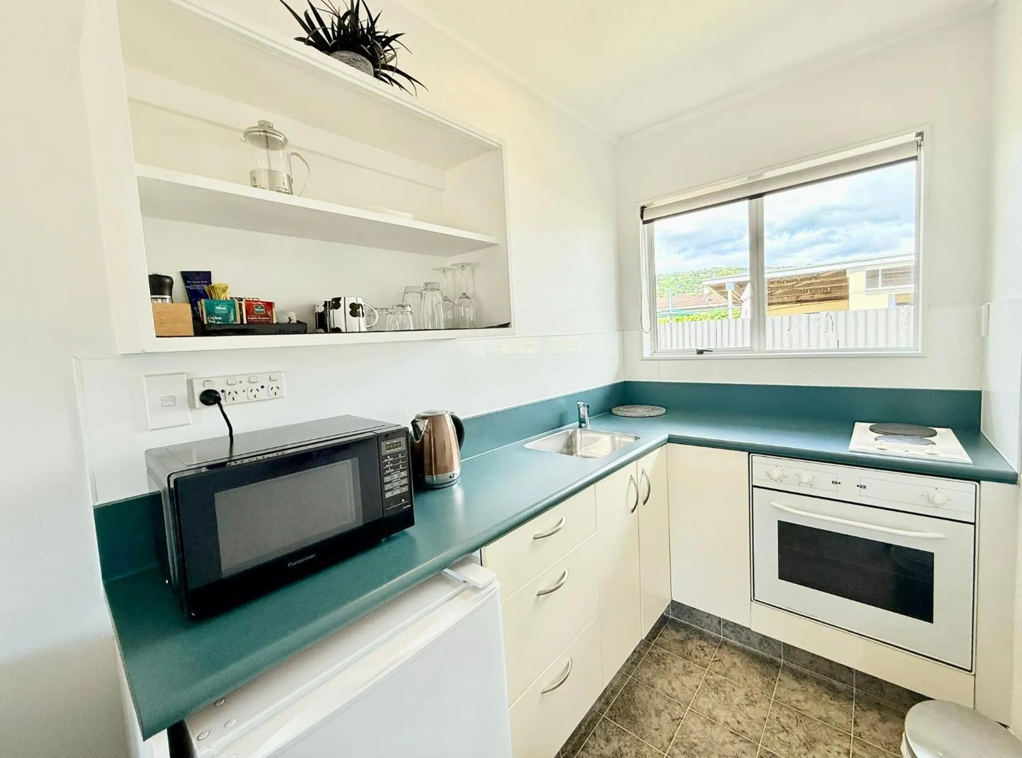 Kitchen or kitchenette in ASURE Fountain Resort Motel