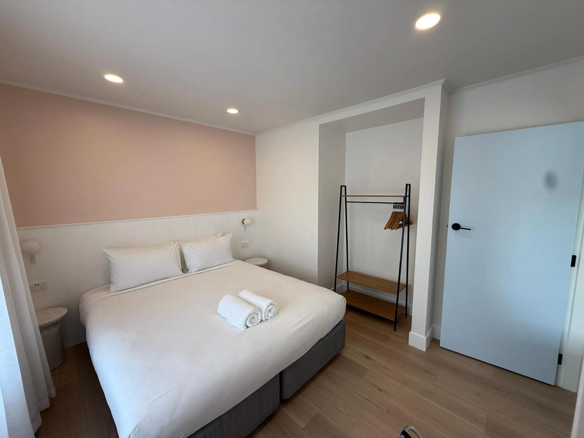 Bed in ASURE Fountain Resort Motel