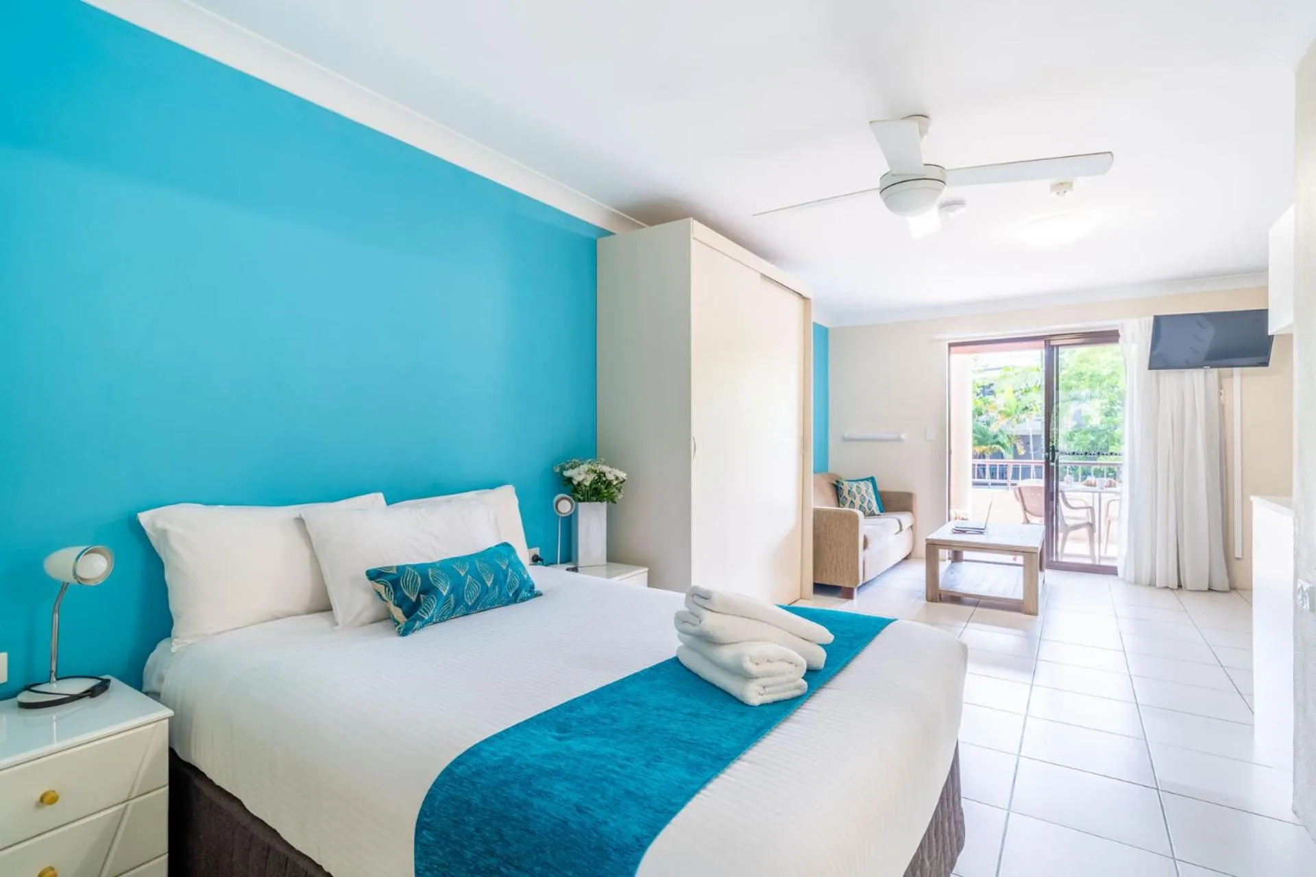 air conditioner, Bed in Byron Bayside Central Studio Apartments