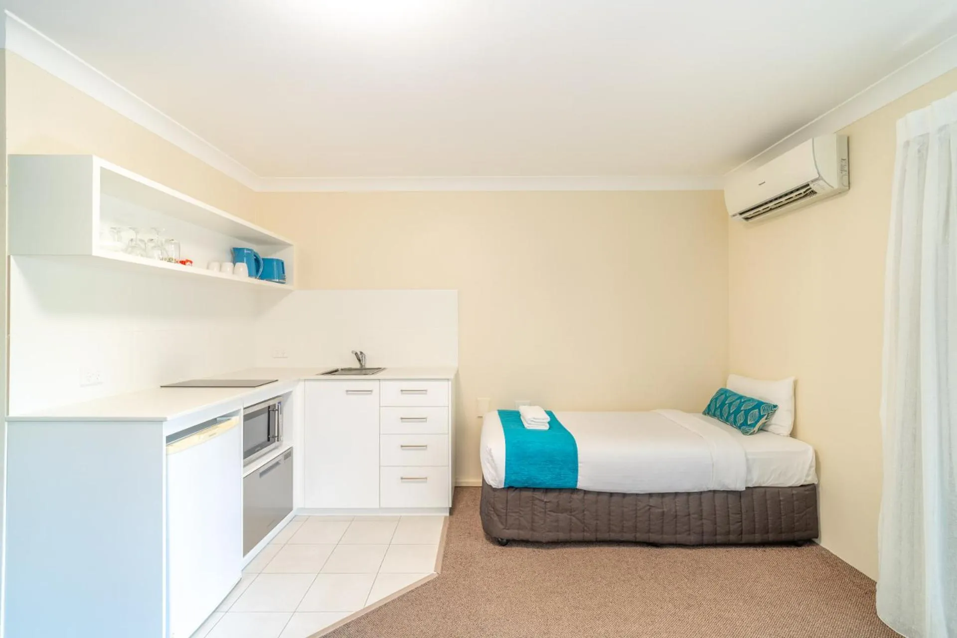 Bed in Byron Bayside Central Studio Apartments