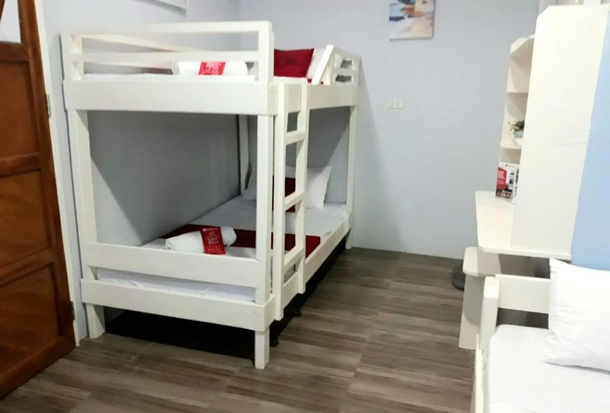 Bed in RedDoorz at Bunakidz Lodge El Nido Palawan