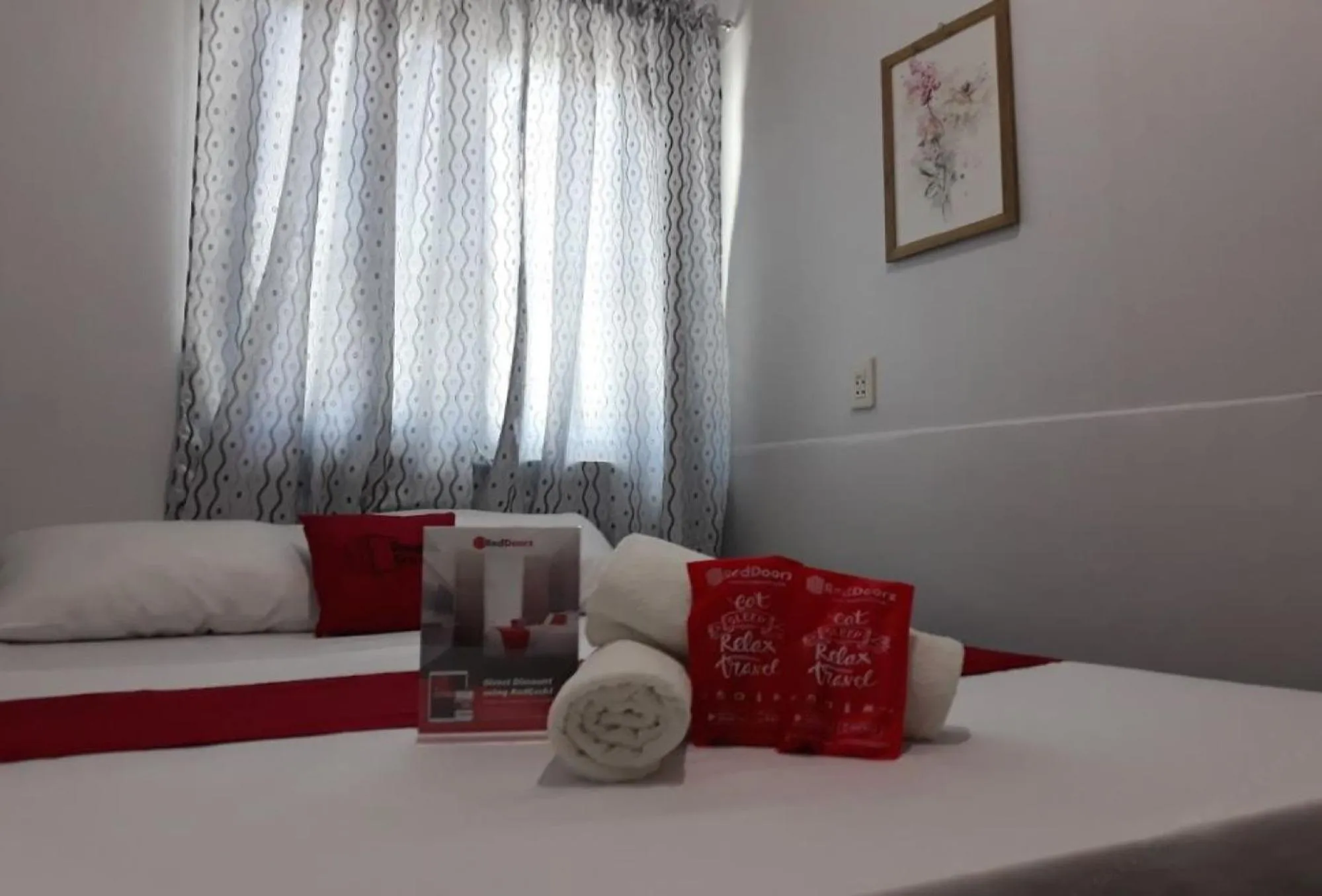 Bed in RedDoorz at Bunakidz Lodge El Nido Palawan