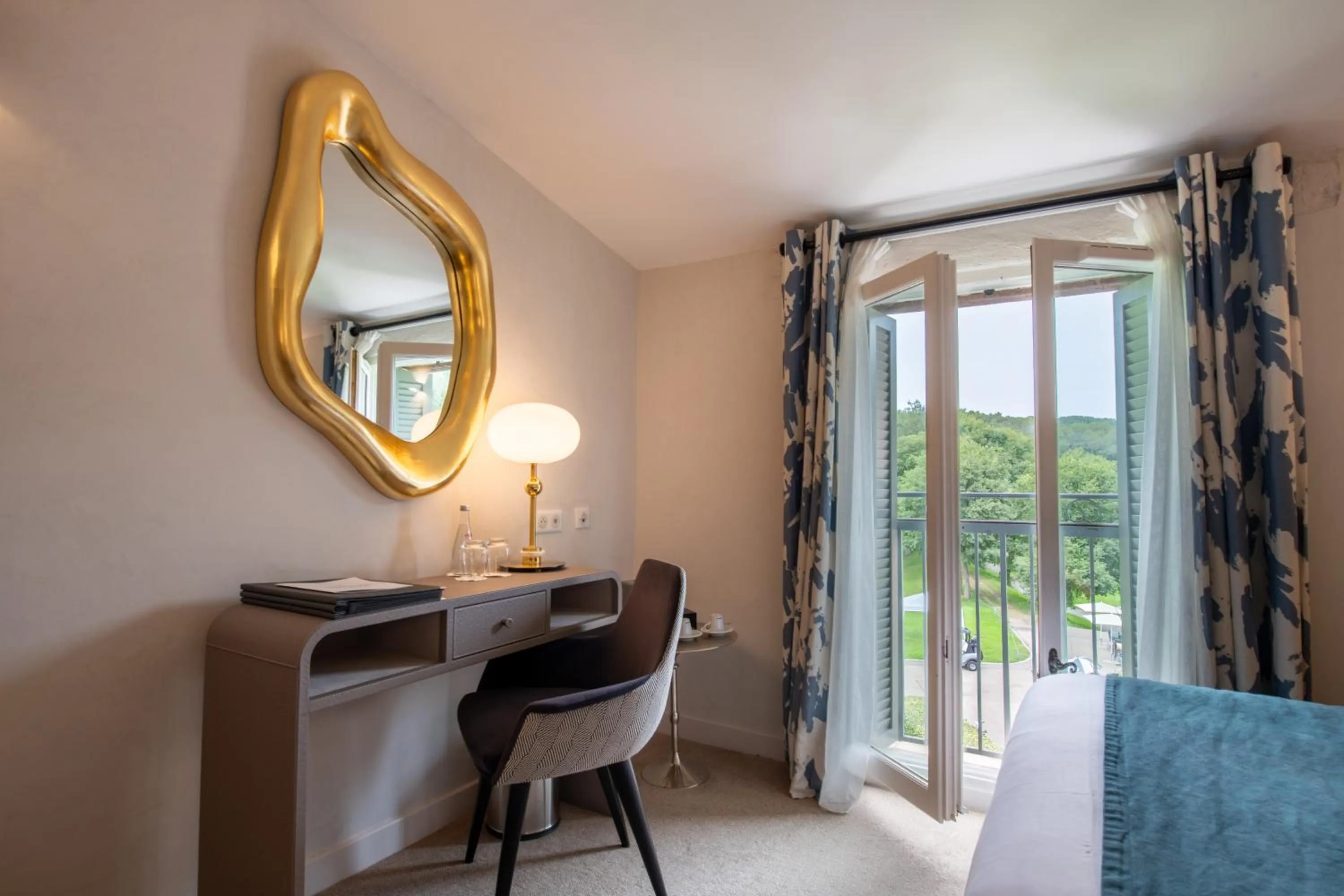 Seating area in Hôtel Golf & Spa Château de la Bégude The Originals Collection