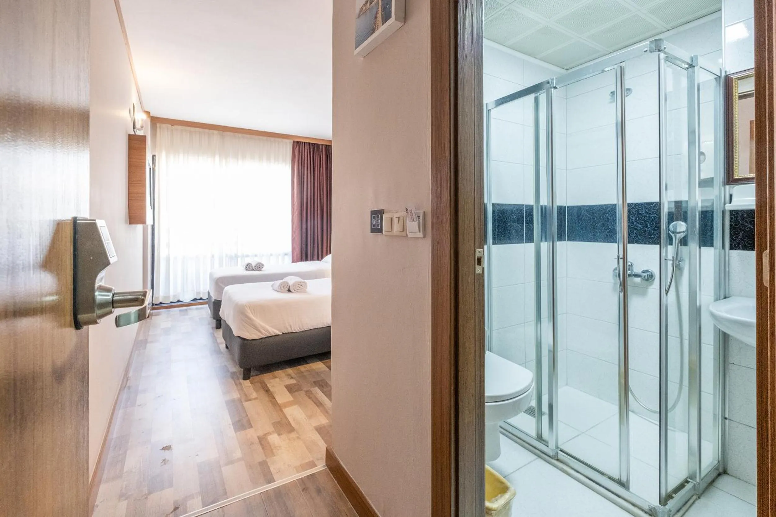 Shower, Bed in Sunday Beach Hotel