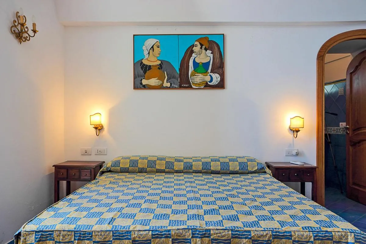 Bed in Villa Il Frantoio and Lilmar