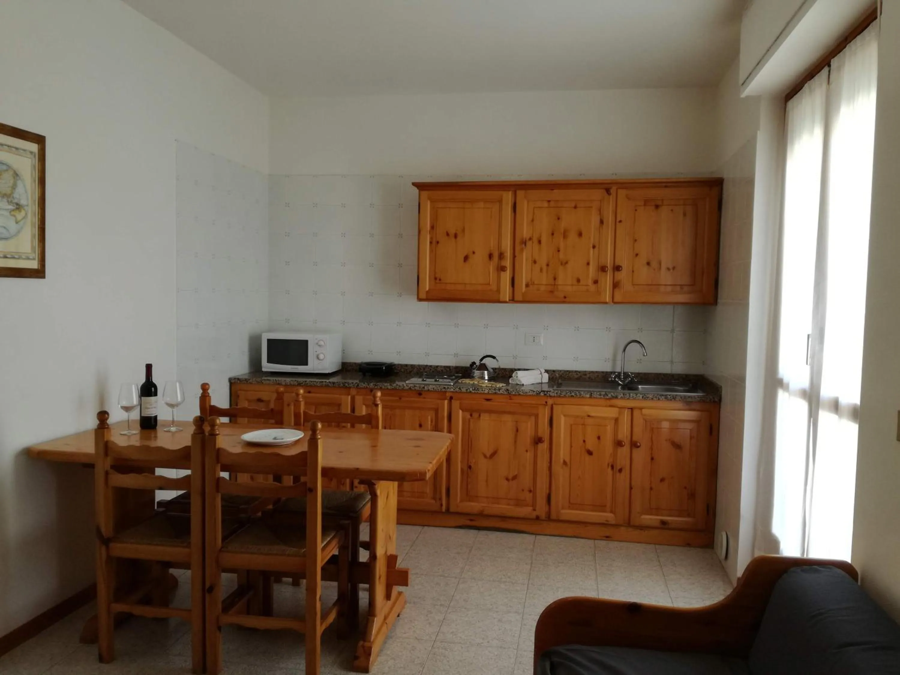 Kitchen or kitchenette in Gardenia Casa Vacanze