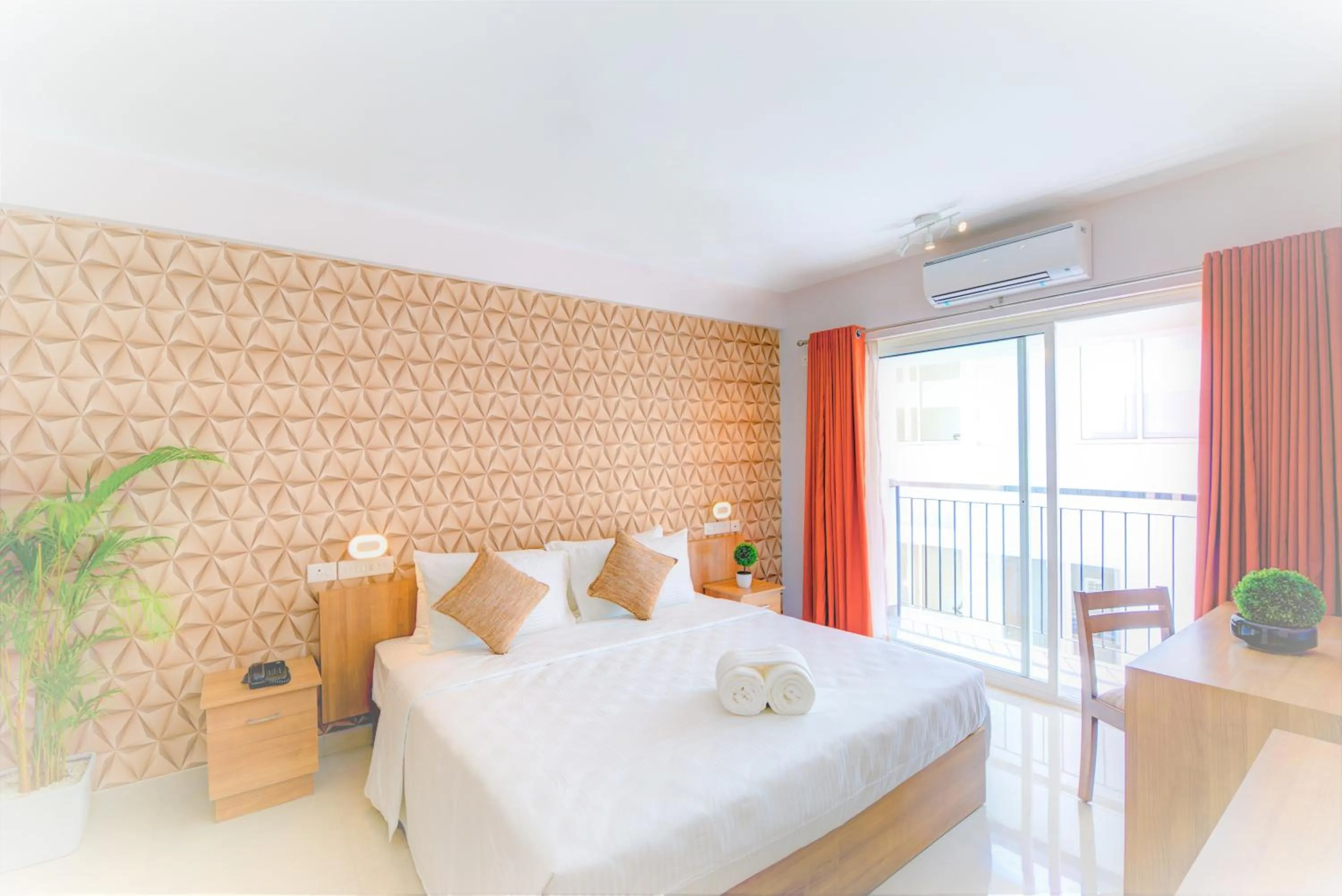 Bed in Sidra Pristine Hotel and Portico Halls