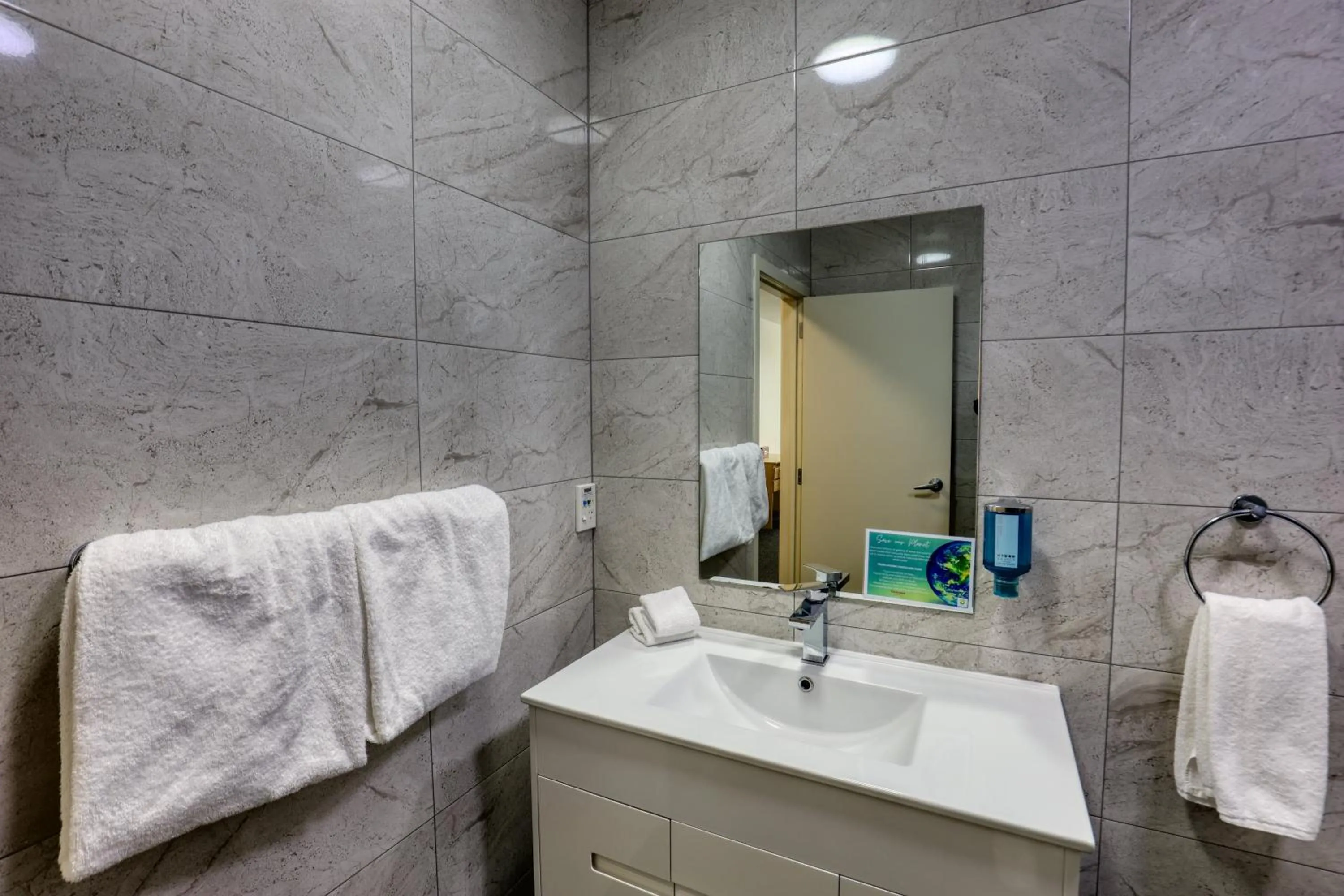 Bathroom in Ramada by Wyndham, Hamilton City Center