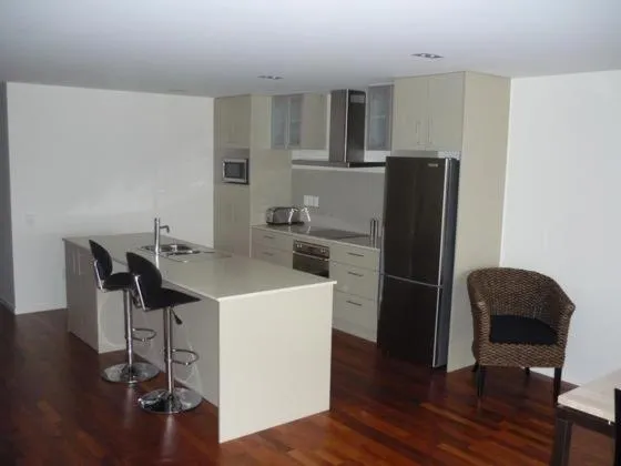 Kitchen or kitchenette in The Waterfront Suites - Heritage Collection