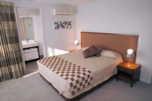 Bed in The Waterfront Suites - Heritage Collection