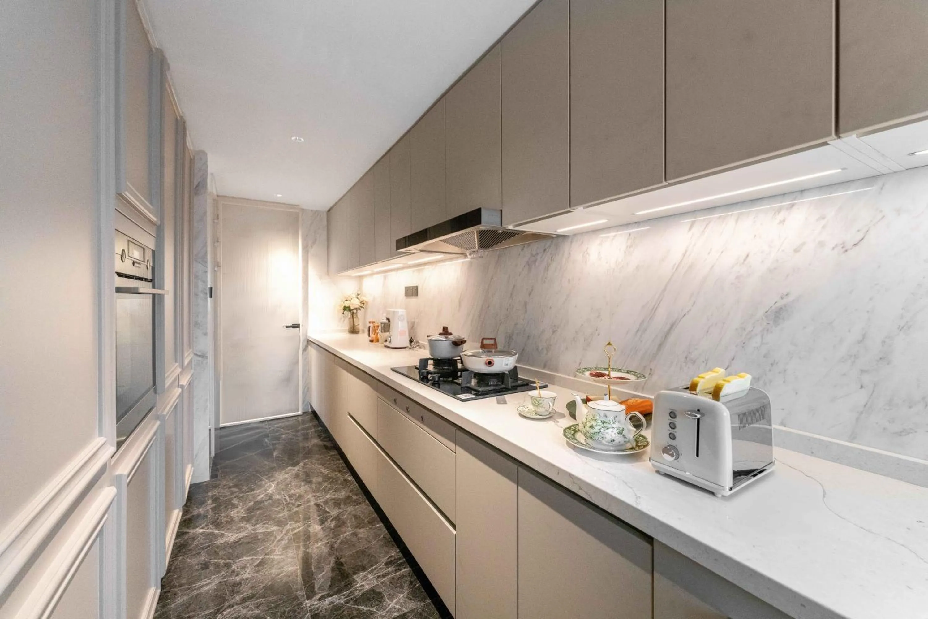 Kitchen or kitchenette in CM+ Service Apartment Shenzhen Taige