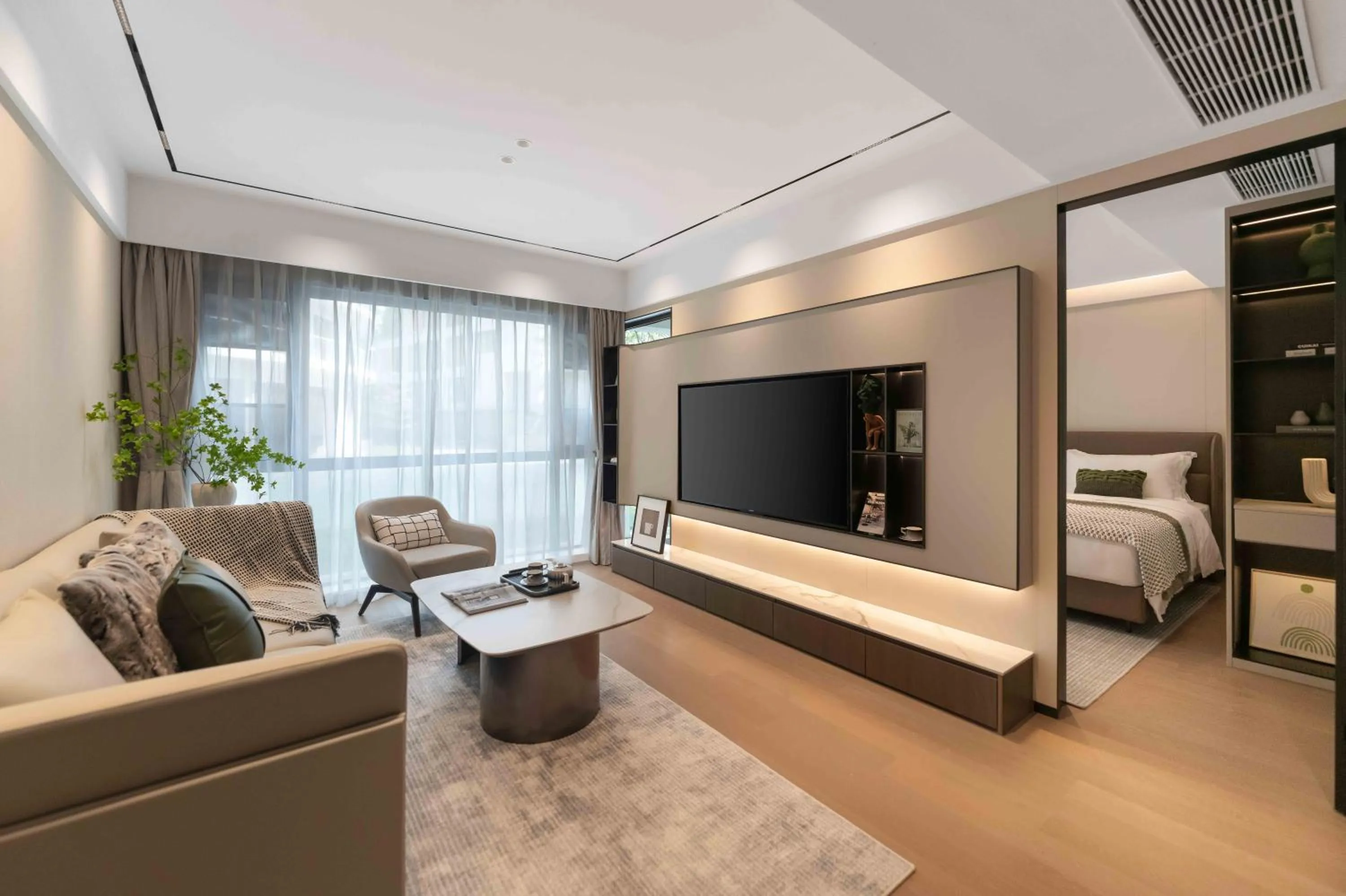 Living room, Bed in CM+ Service Apartment Shenzhen Taige