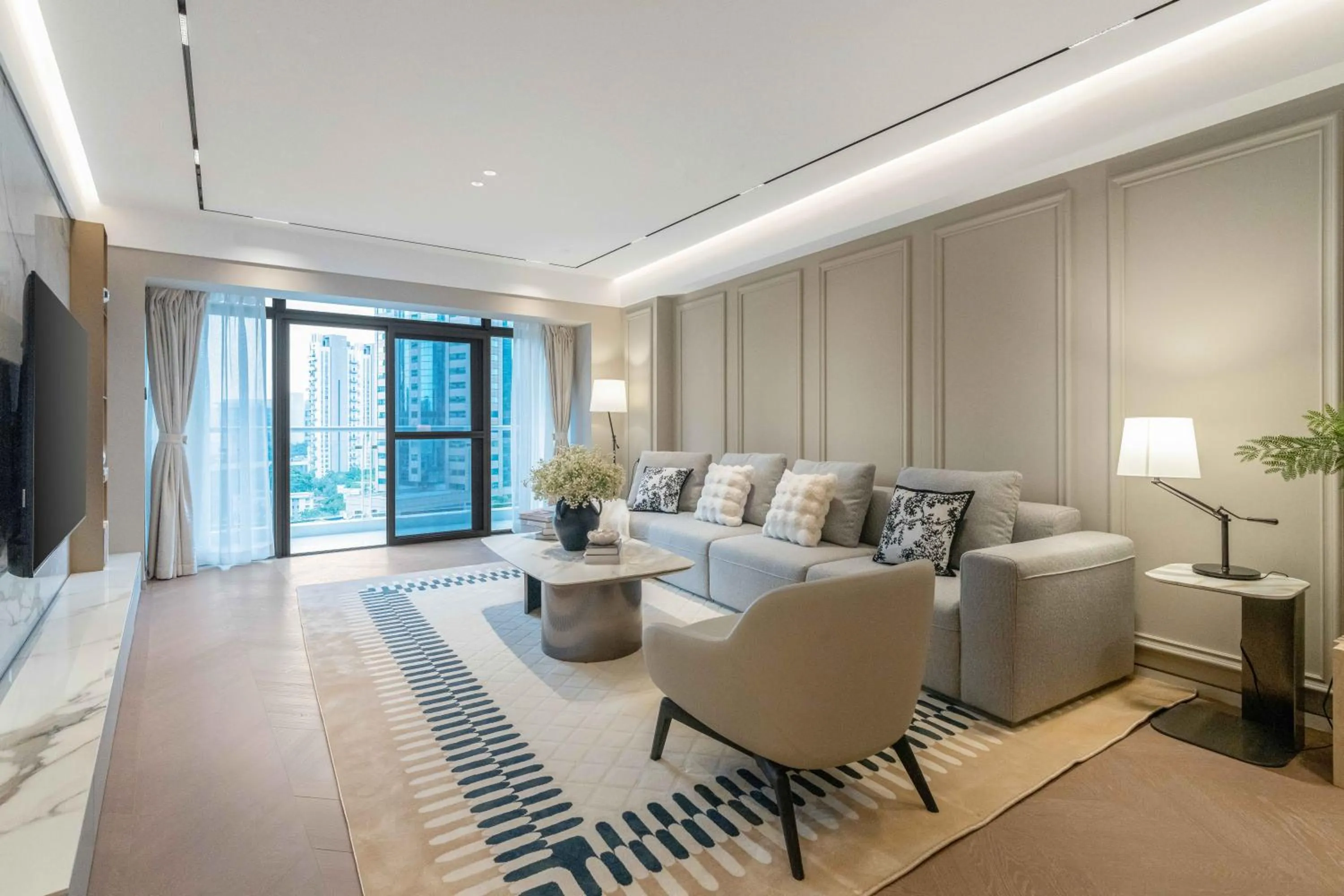 Living room in CM+ Service Apartment Shenzhen Taige