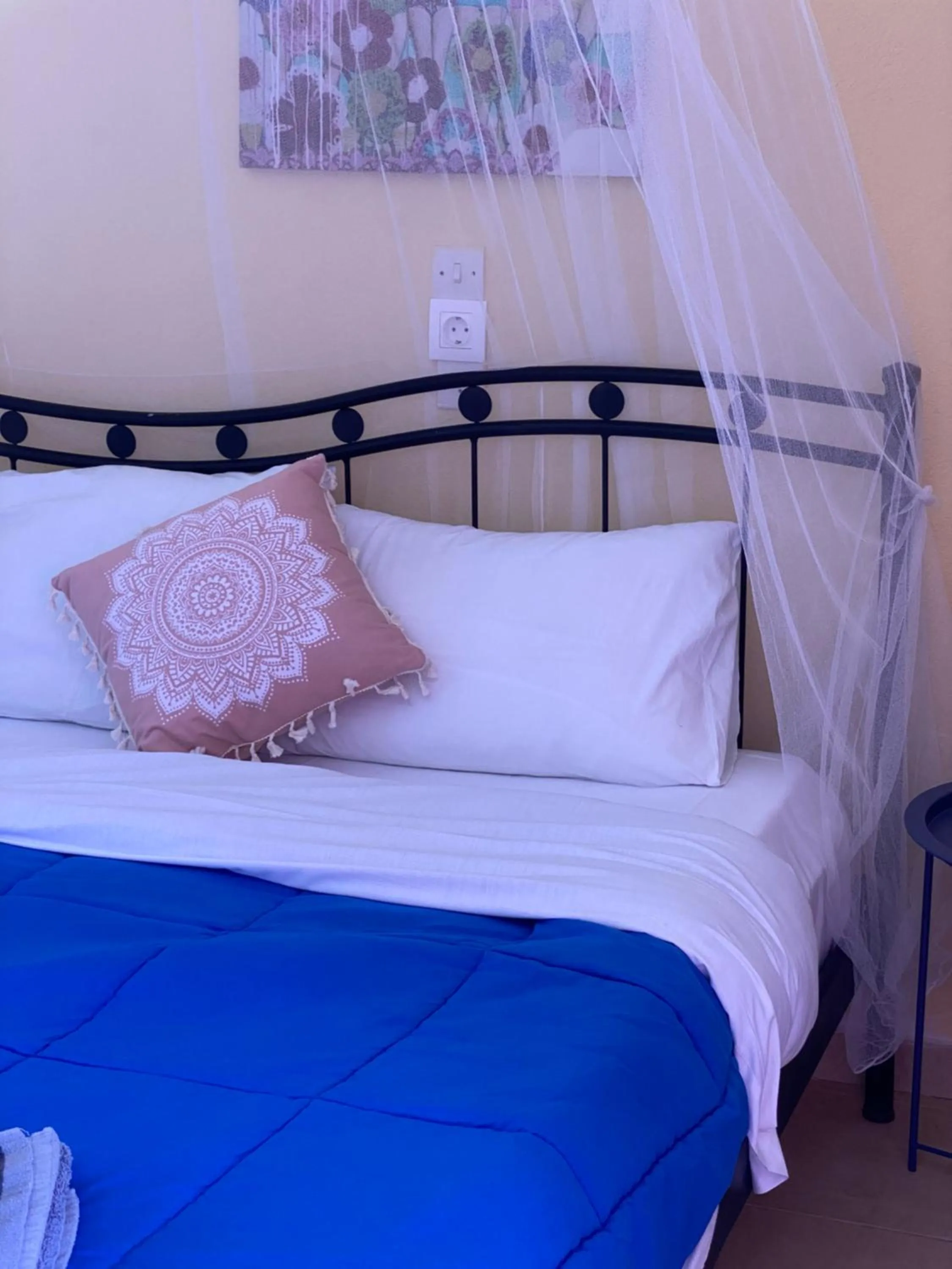Bed in Avra Budget Beach Rooms