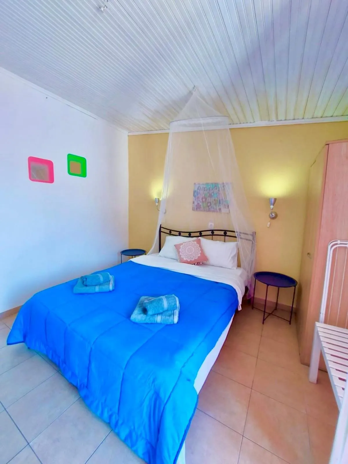 Bed in Avra Budget Beach Rooms