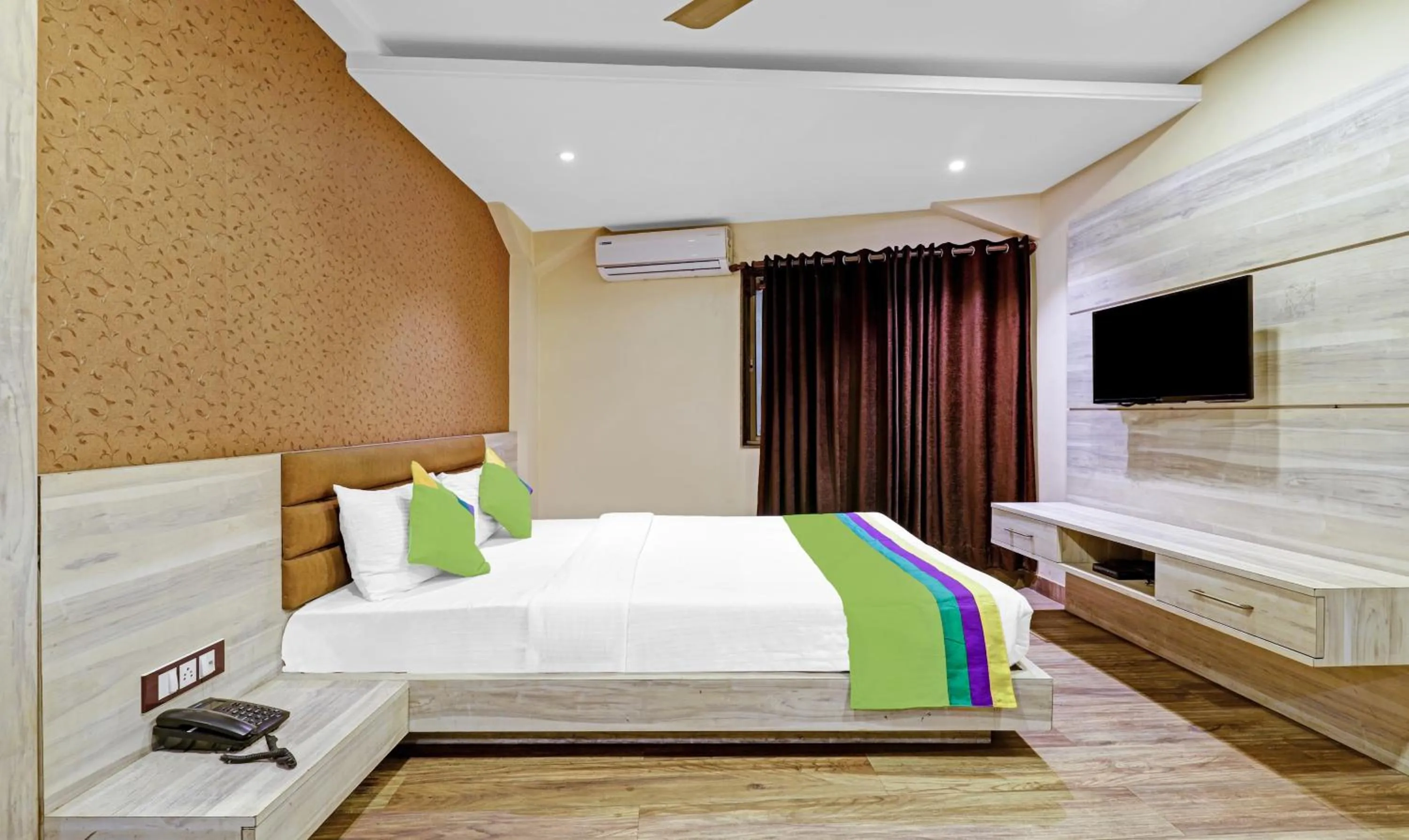 Bedroom, Bed in Treebo Apollo