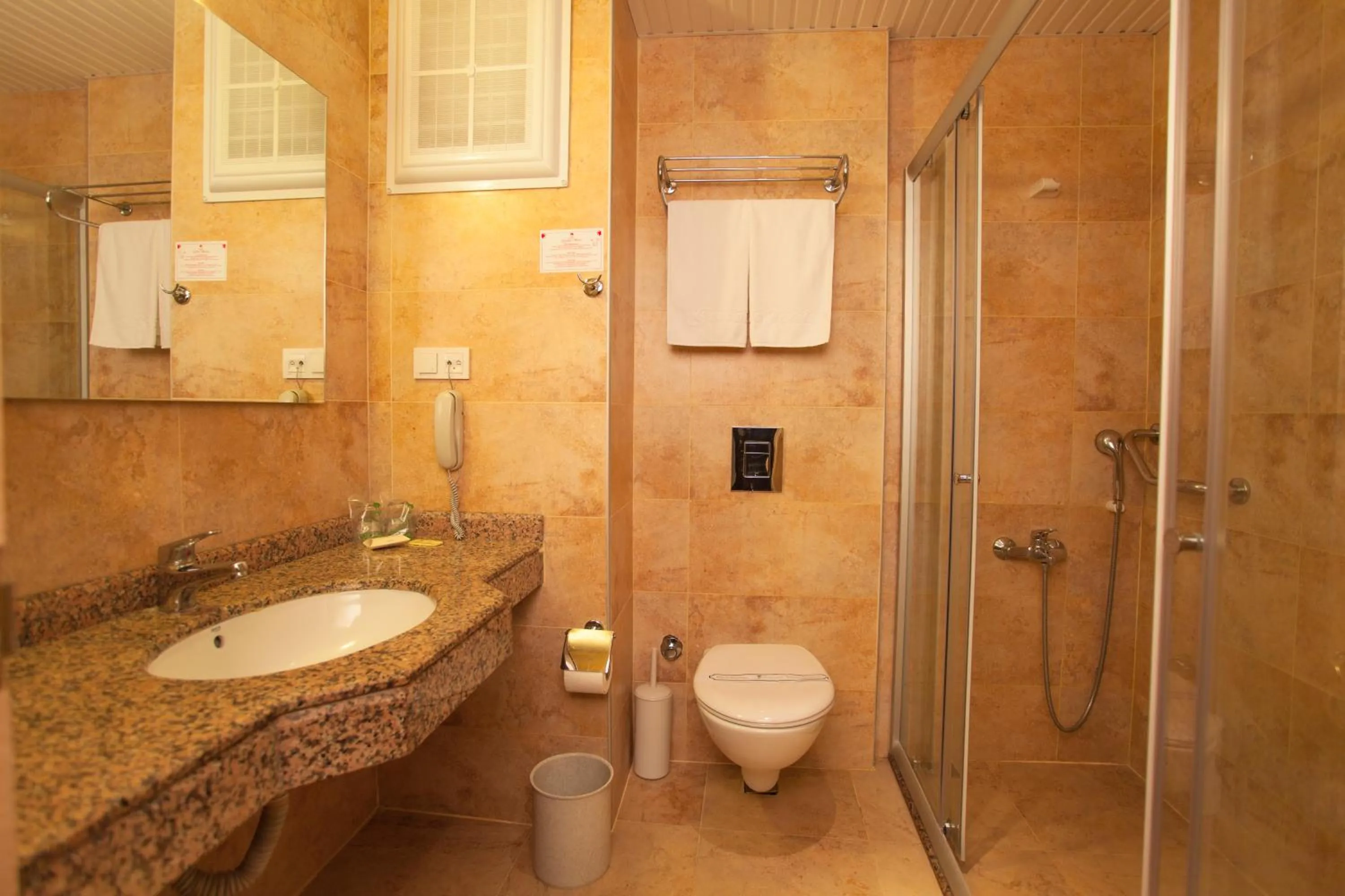 Bathroom in Gardenia Hotel