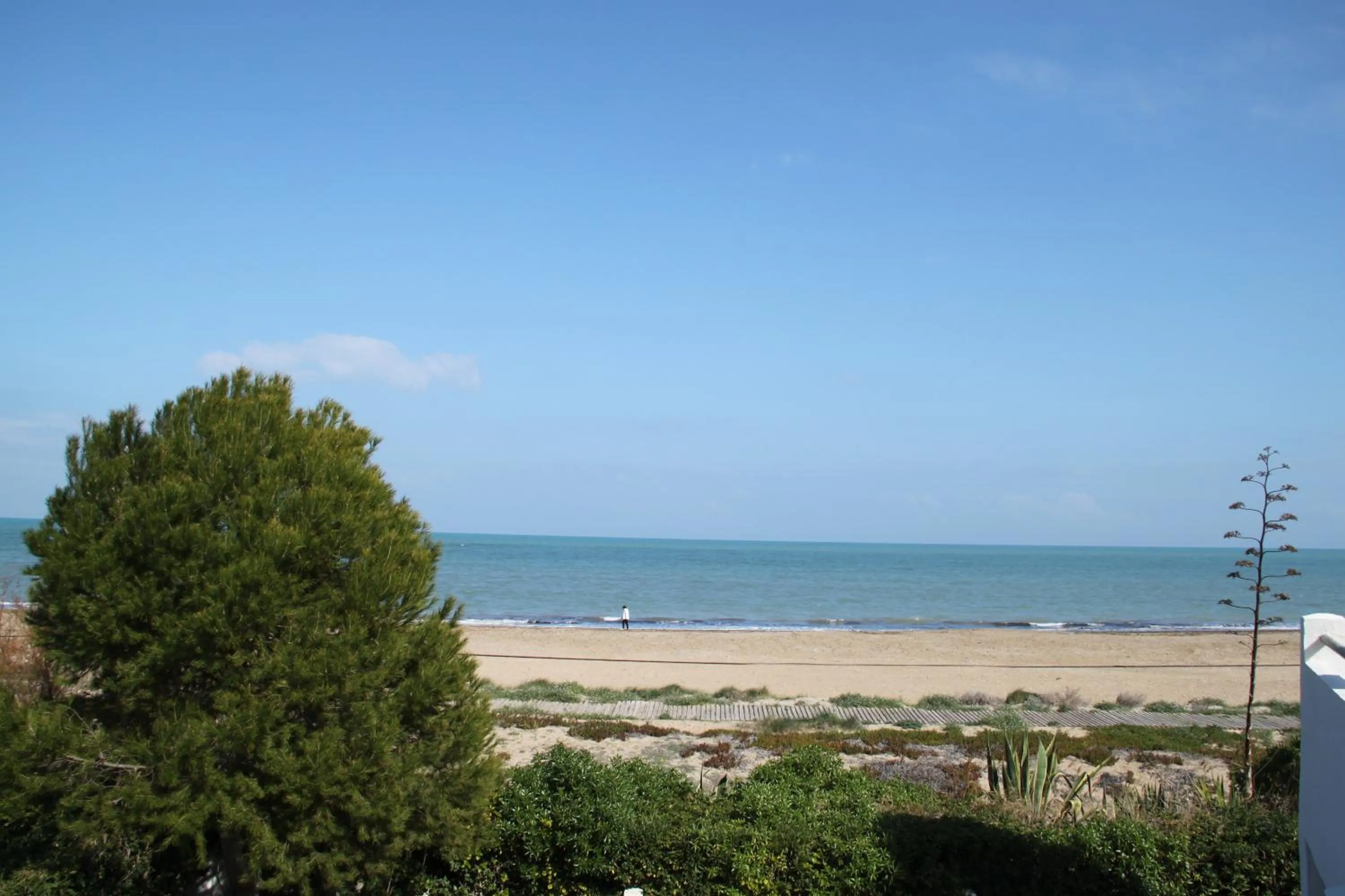 Day in Meerblick & Pool! Traumhaftes Reihenhaus am Strand