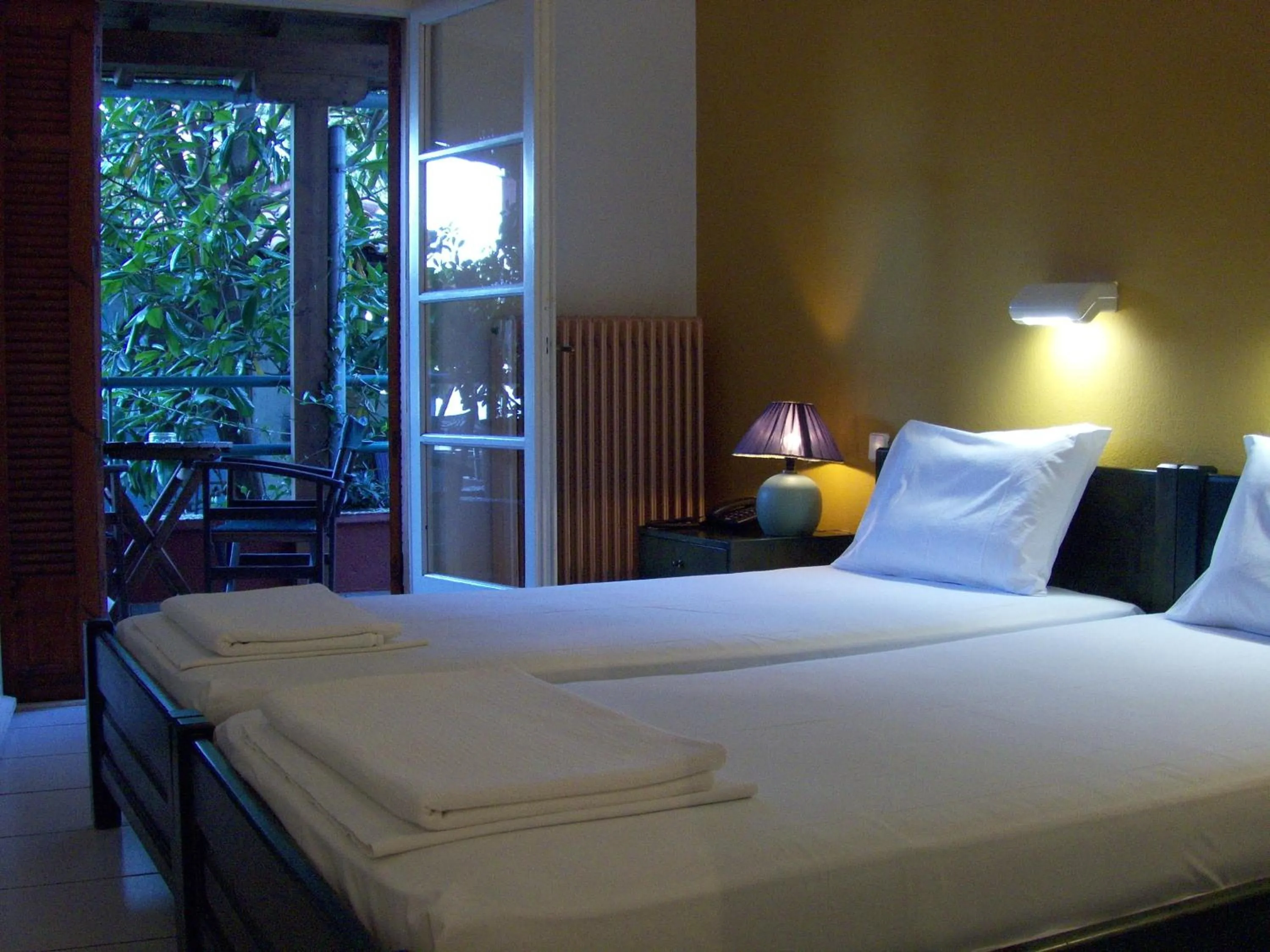 Bed in Anesis Hotel
