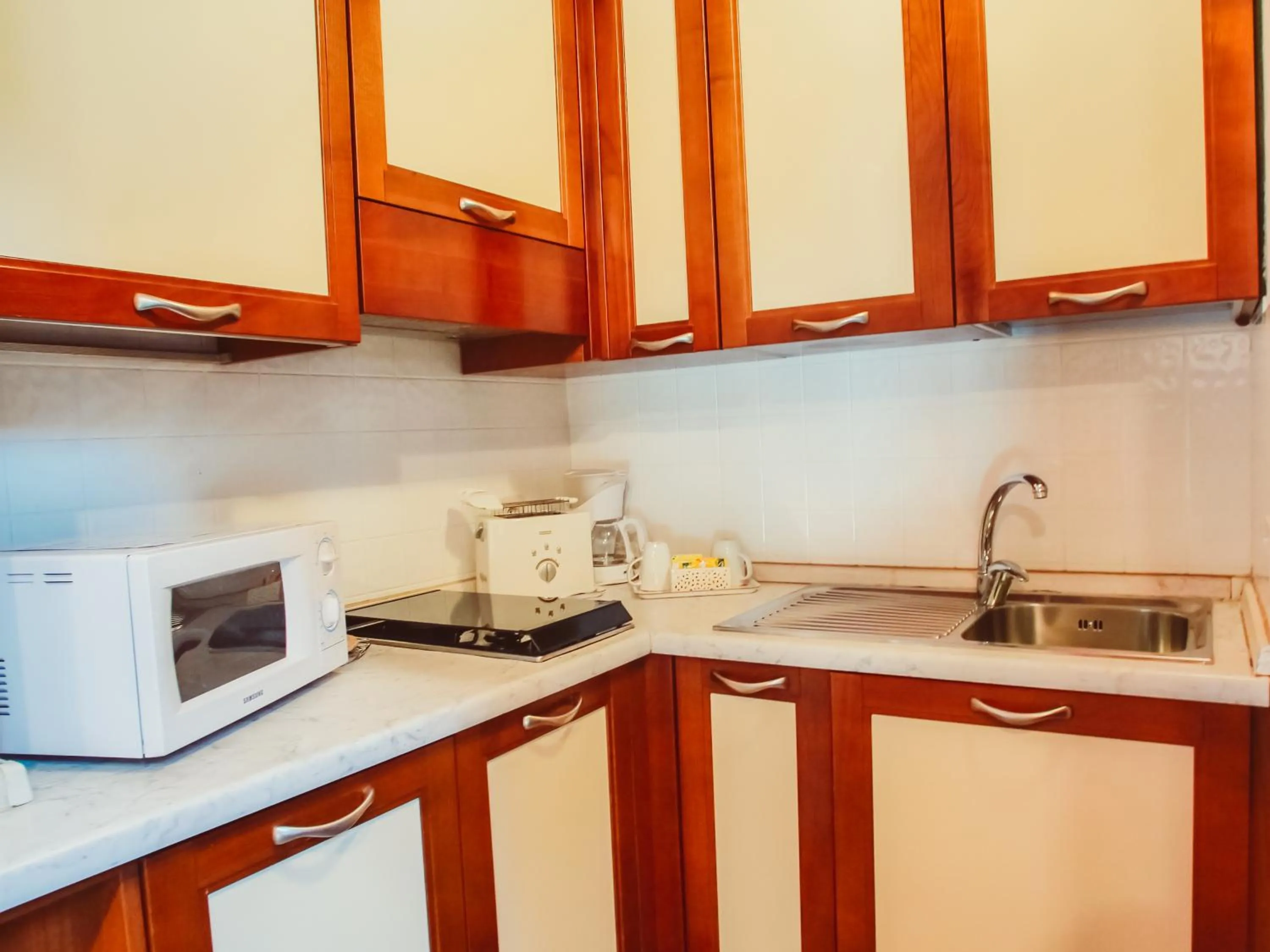 Kitchen or kitchenette in Antico Pozzo Apartment