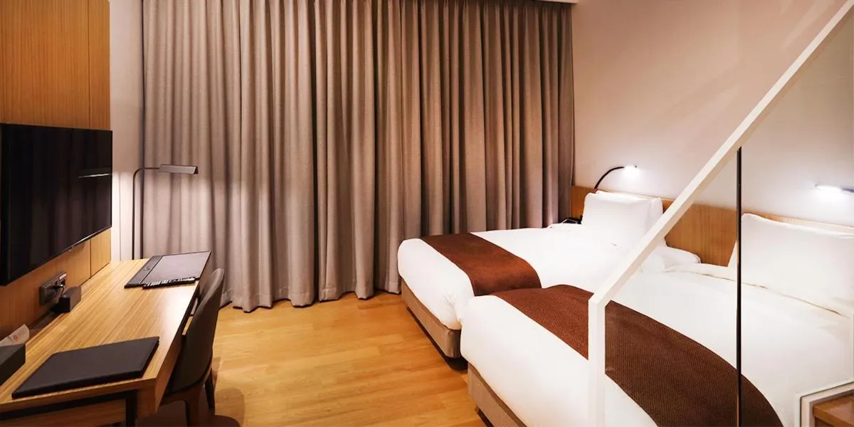 Bed in Midas Hotel & Resort