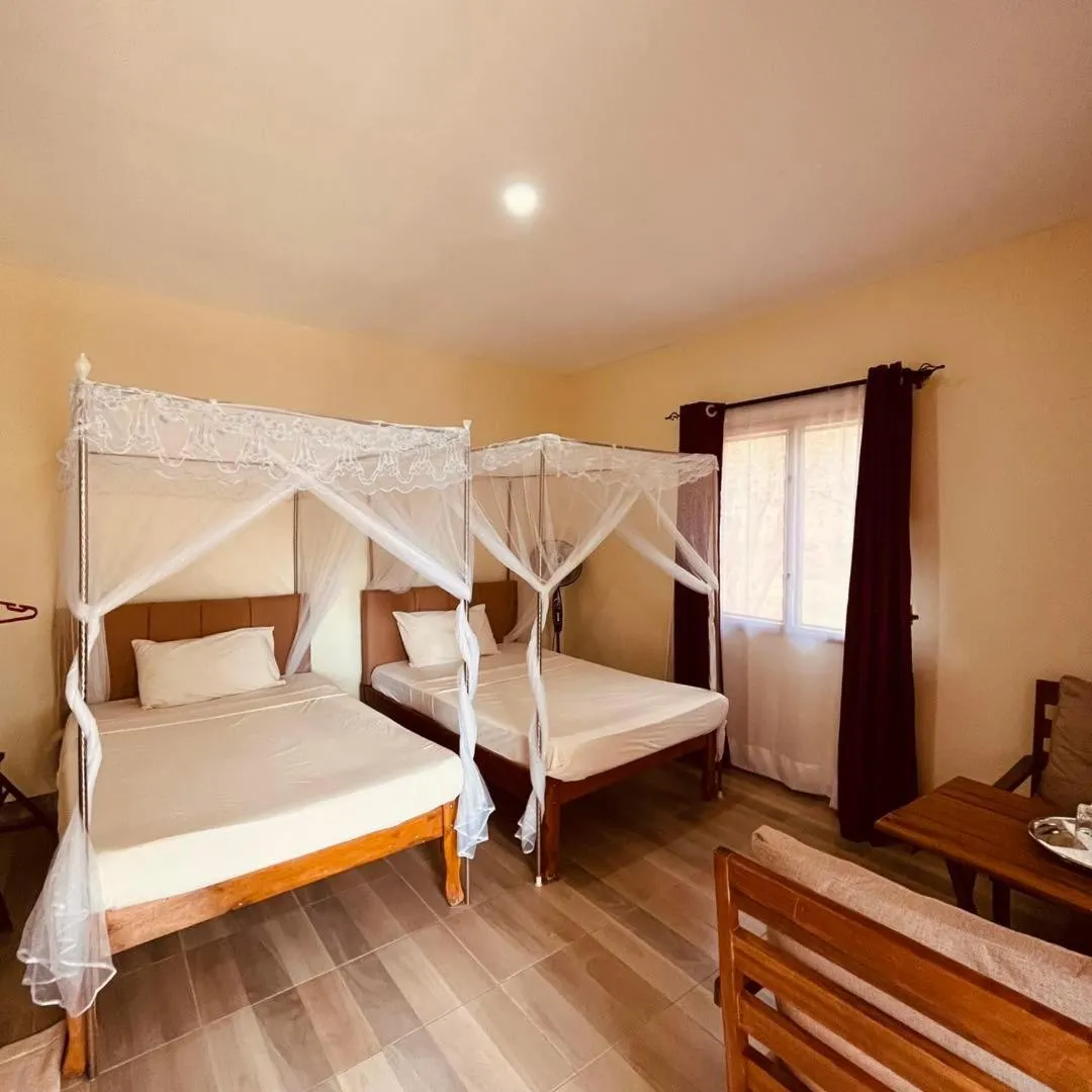 Bed in Lake Jipe Eco Lodge