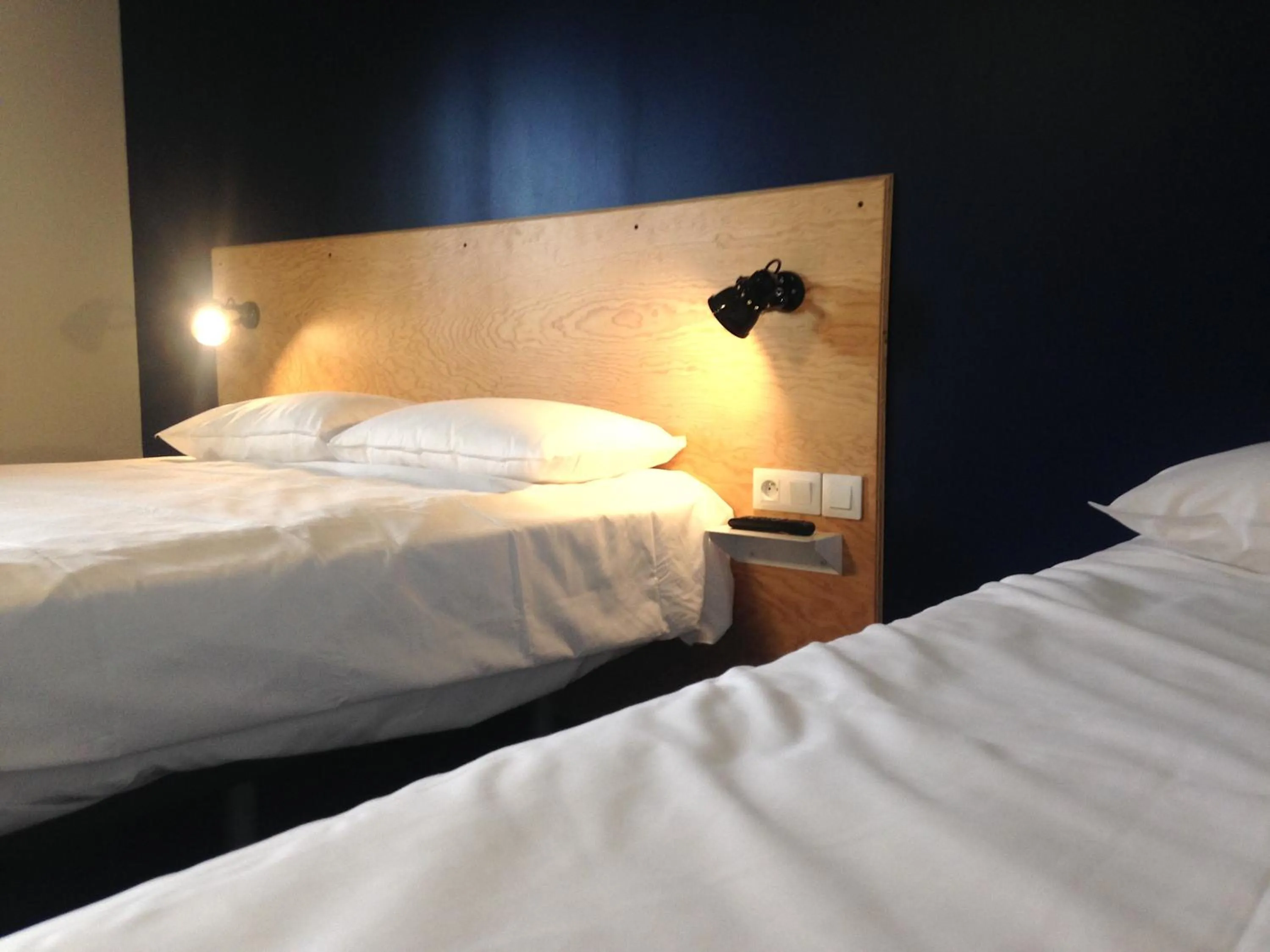 Bed in Eklo Hotels Lille