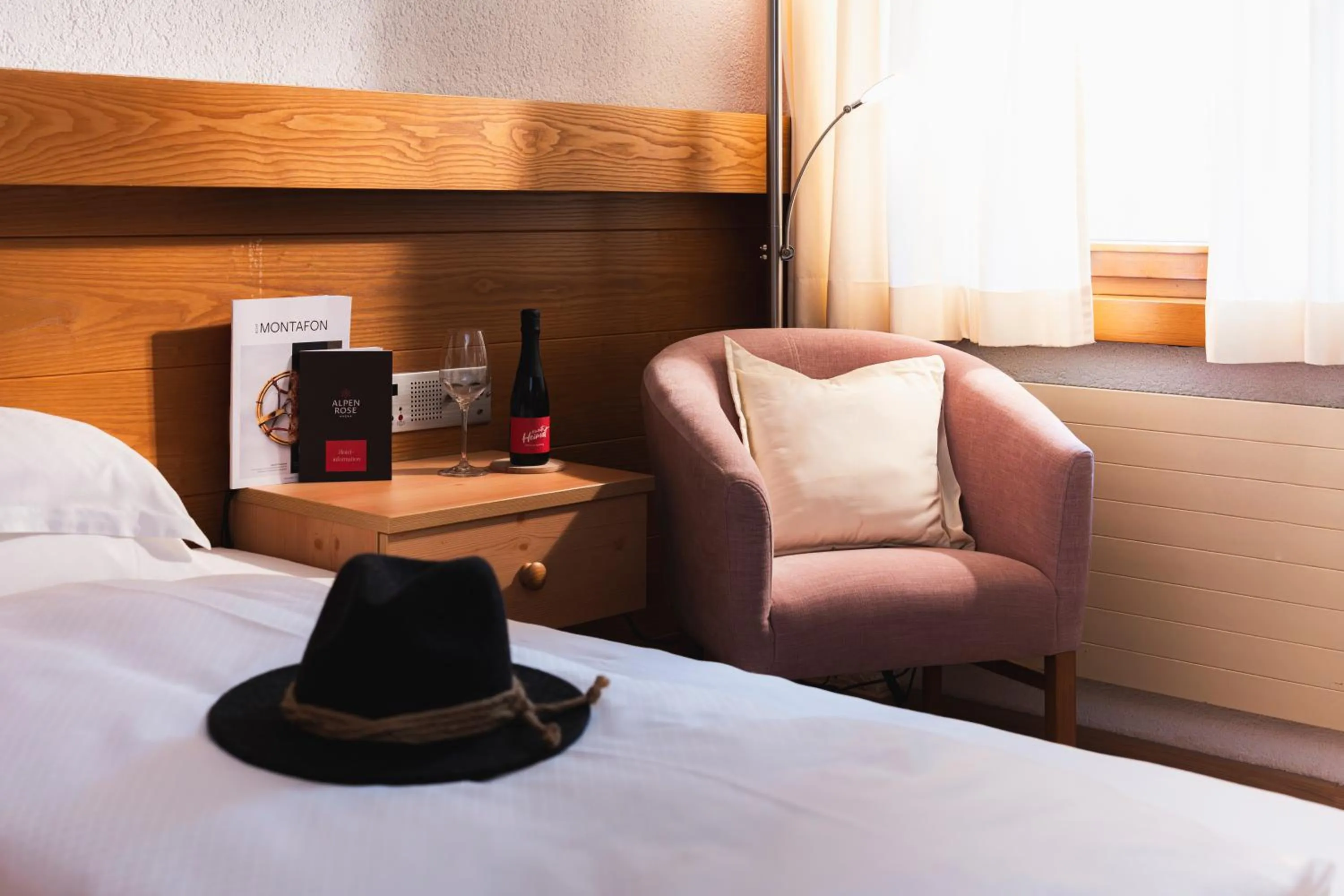 Seating area, Bed in Aktiv & Spa Hotel Alpenrose