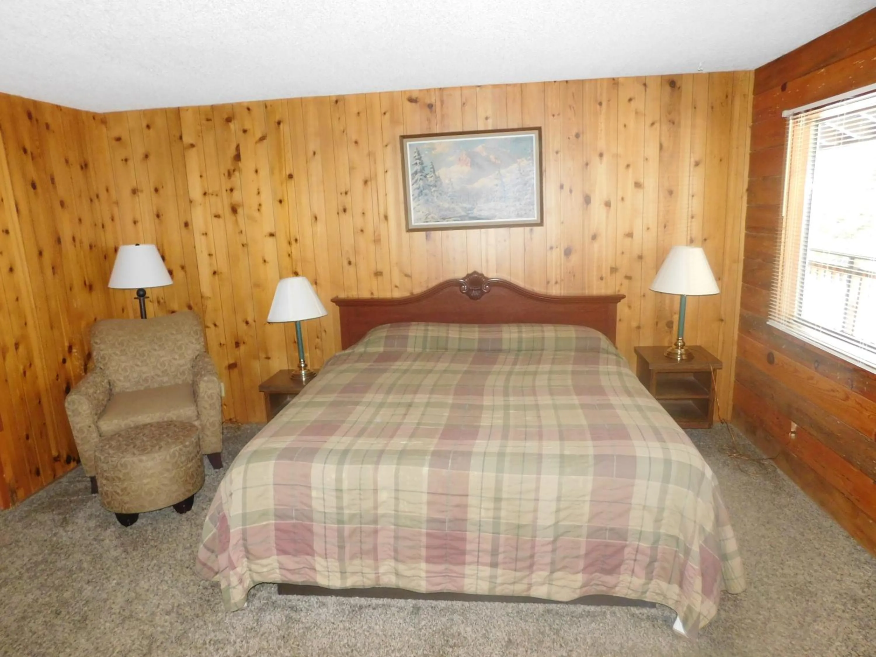 Bed in The Tamarack Lodge