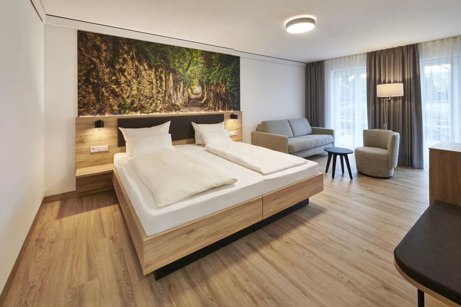 Photo of the whole room, Bed in Kreuz-Post Hotel-Restaurant-SPA