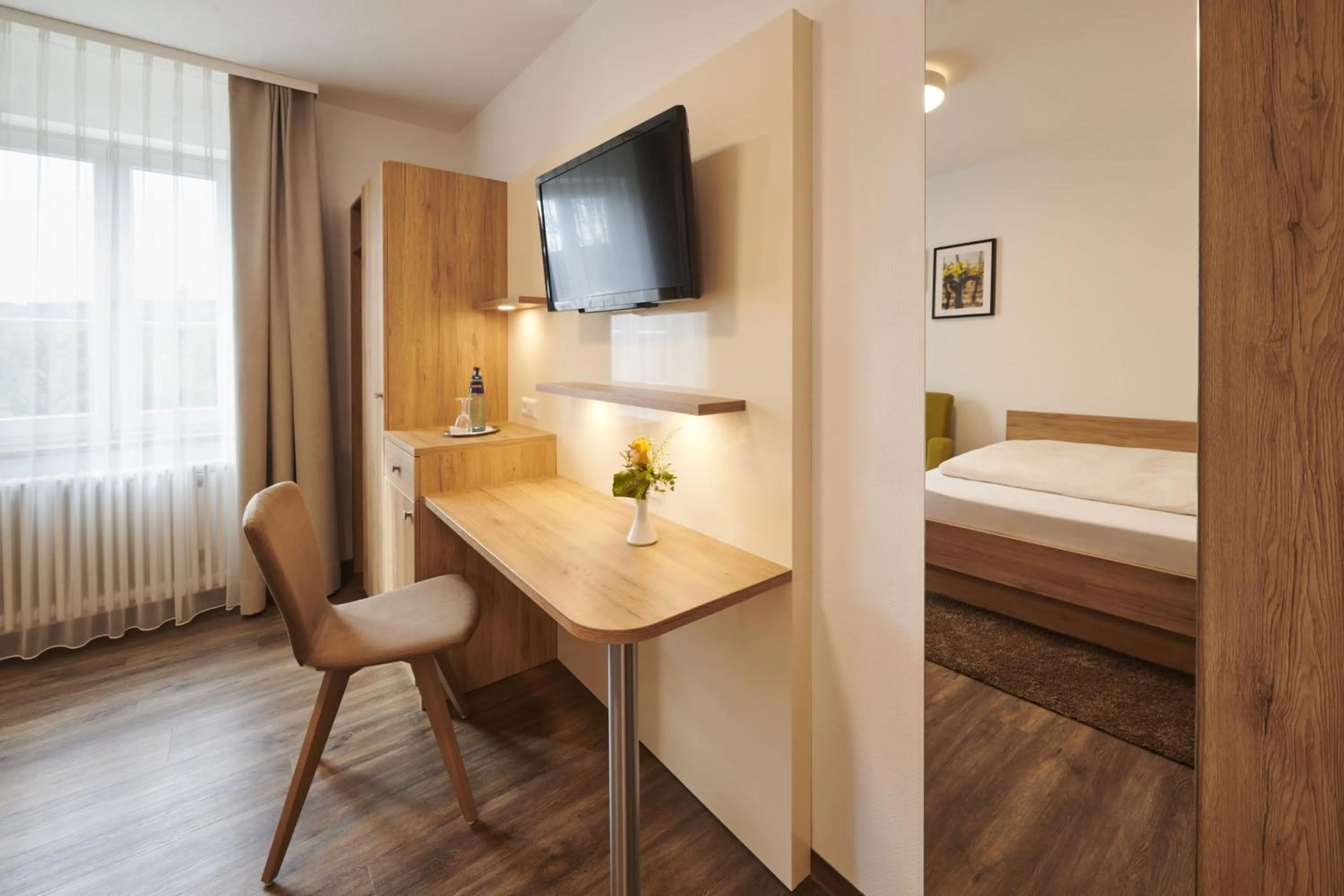 Photo of the whole room, Bed in Kreuz-Post Hotel-Restaurant-SPA