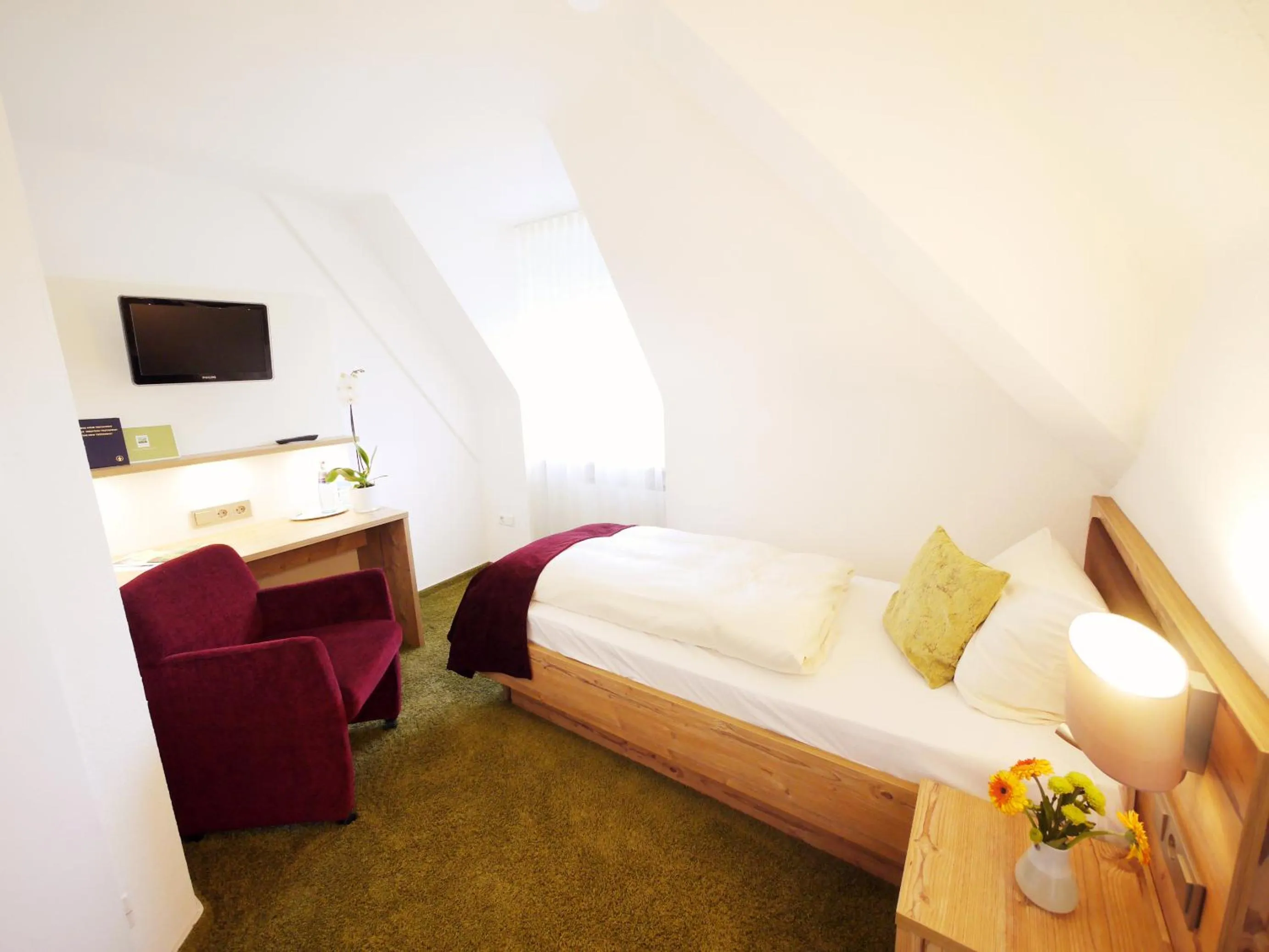 Photo of the whole room, Bed in Kreuz-Post Hotel-Restaurant-SPA