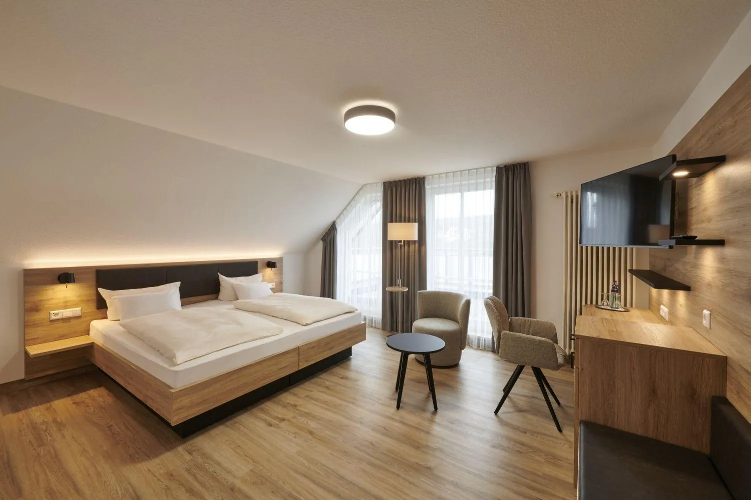 Photo of the whole room, Bed in Kreuz-Post Hotel-Restaurant-SPA