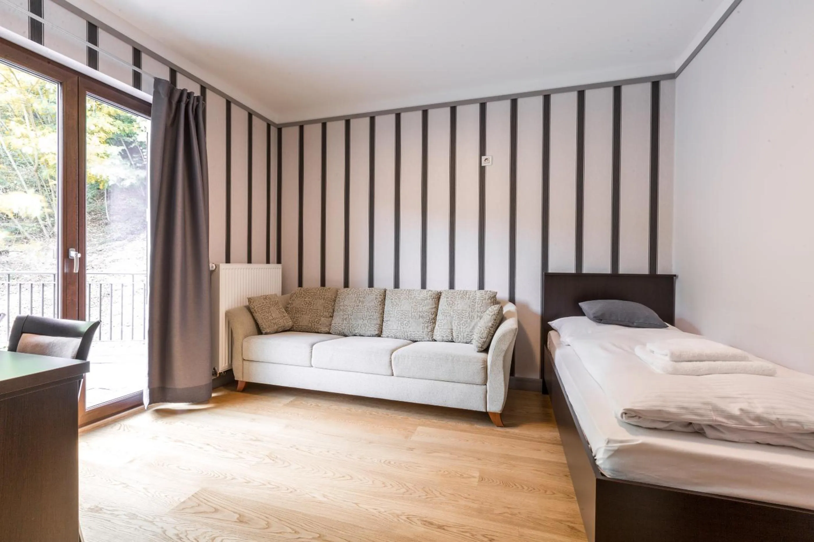 Photo of the whole room, Bed in Hotel Mandát