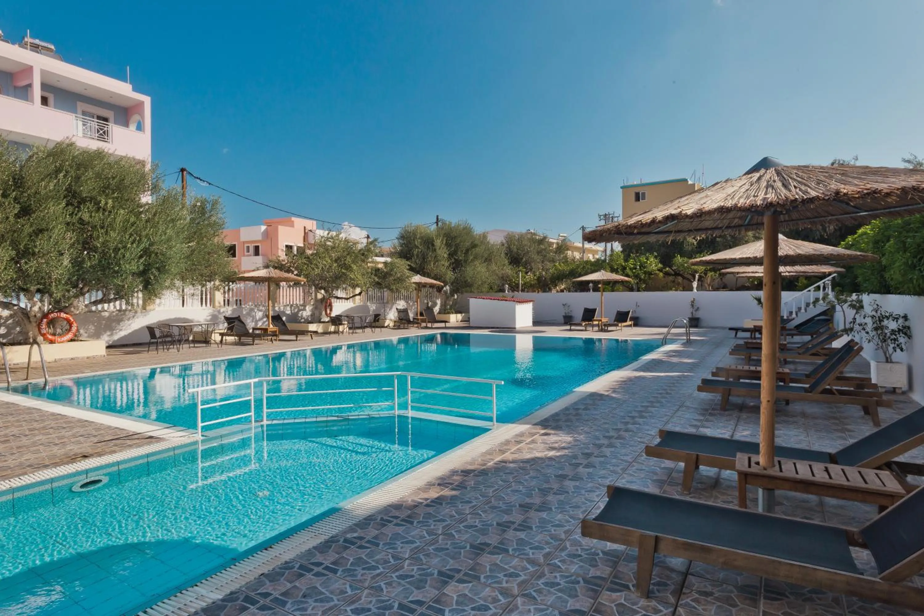 Swimming pool in Regina Studios & Hotel