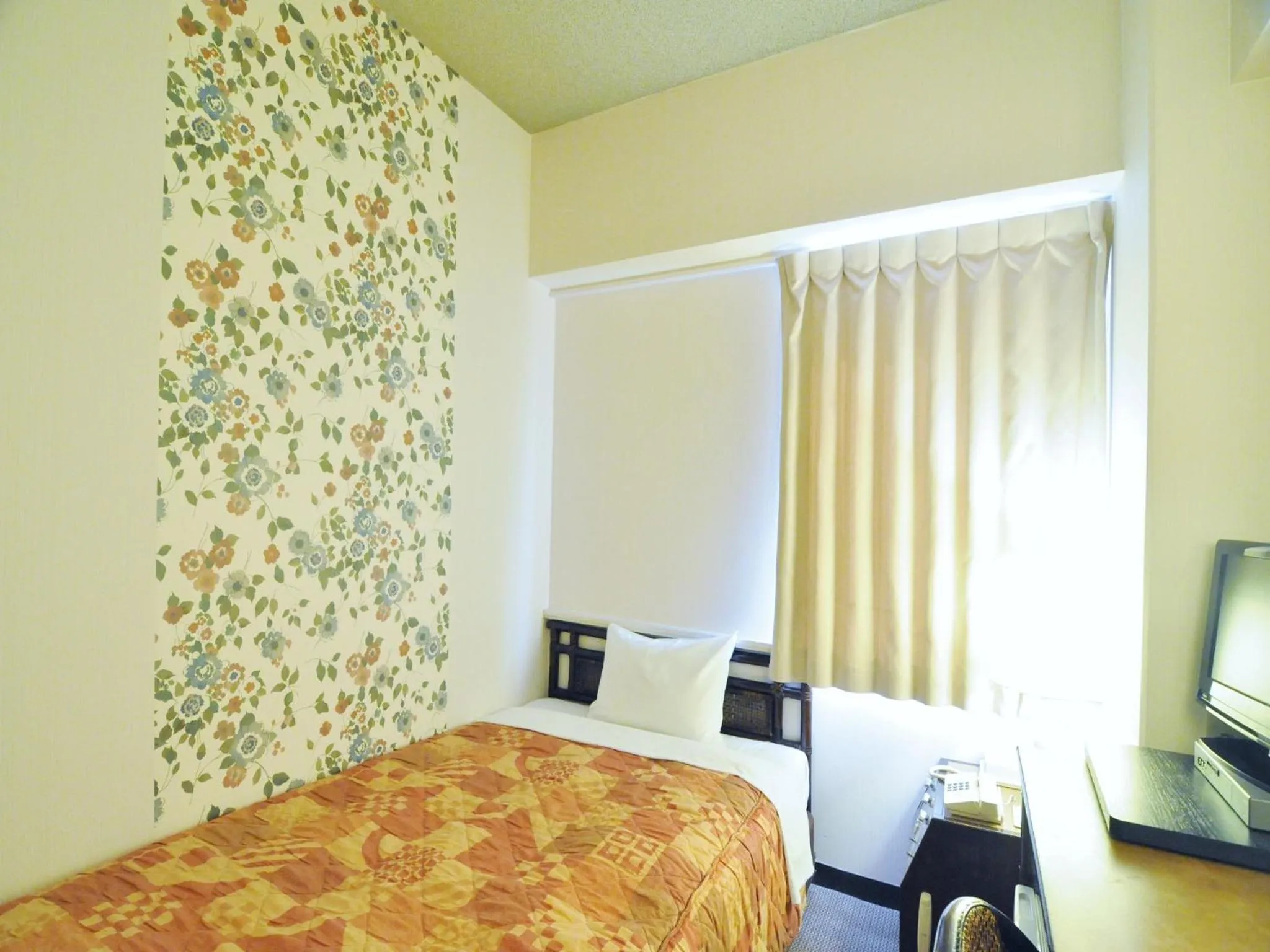 Bed in Yamagata Nanokamachi Washington Hotel