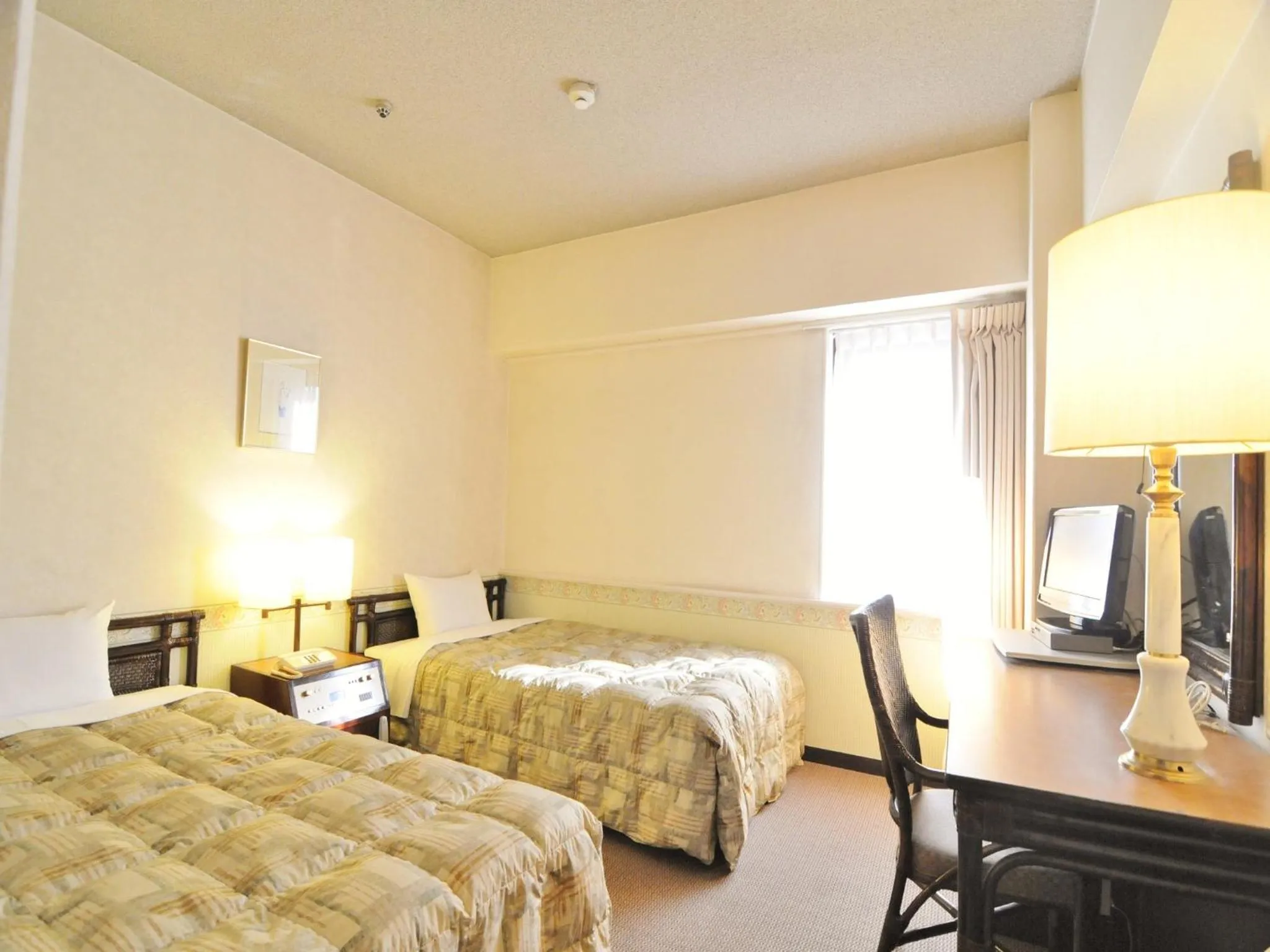 Bed in Yamagata Nanokamachi Washington Hotel