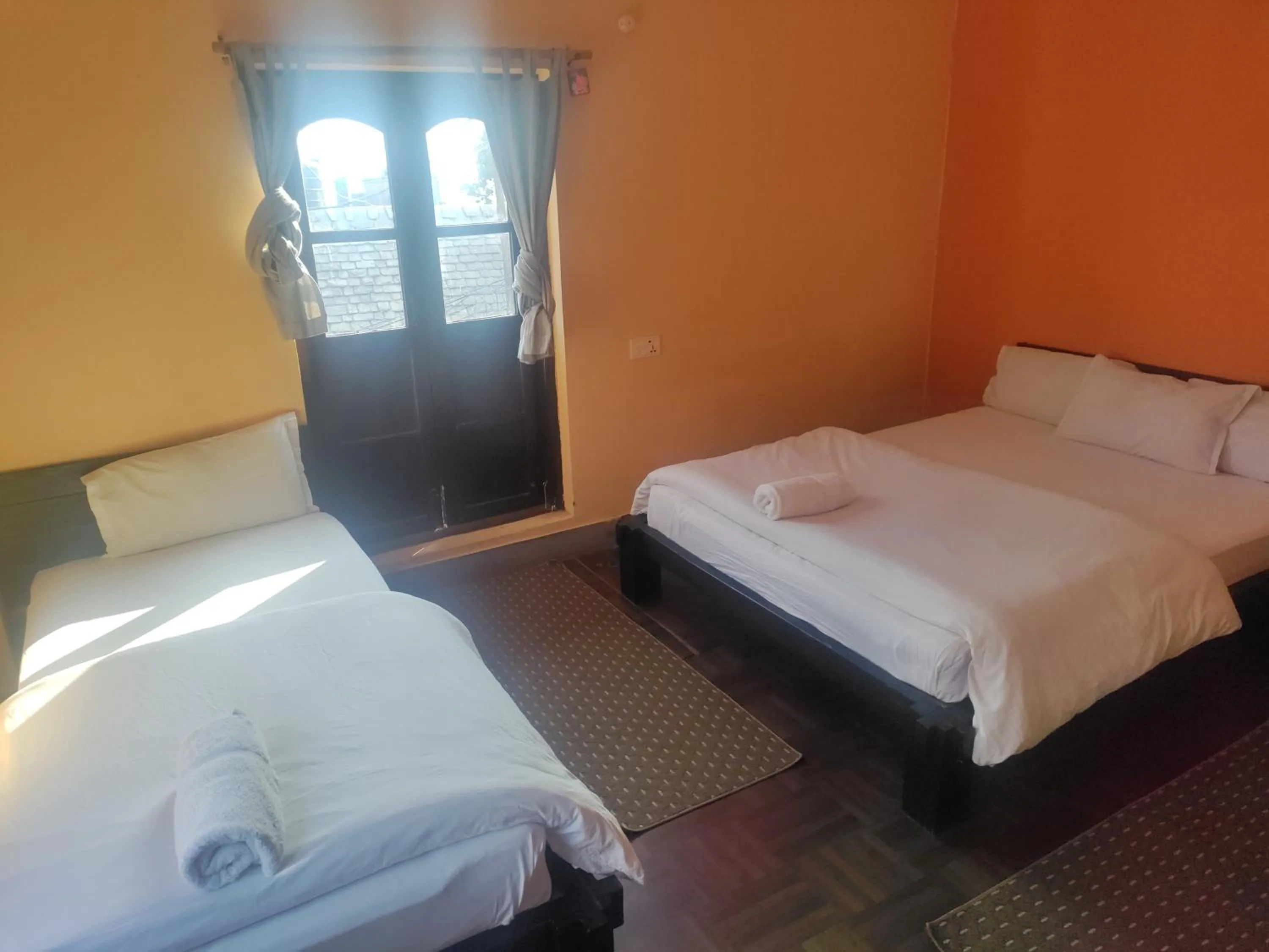 Bed in Bandipur Kaushi Inn