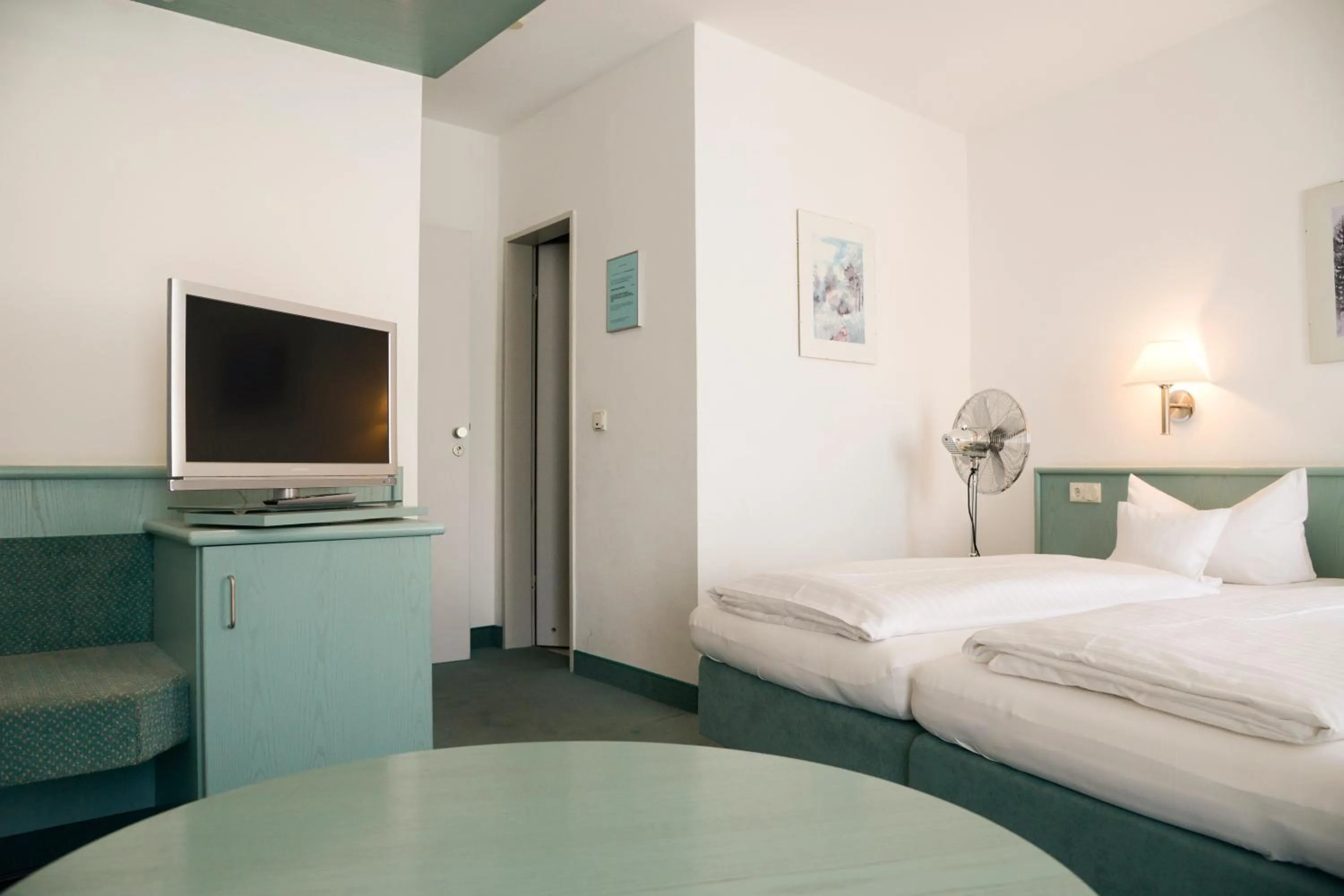 Bed in Hotel Till Eulenspiegel - Nichtrauchhotel - Garni