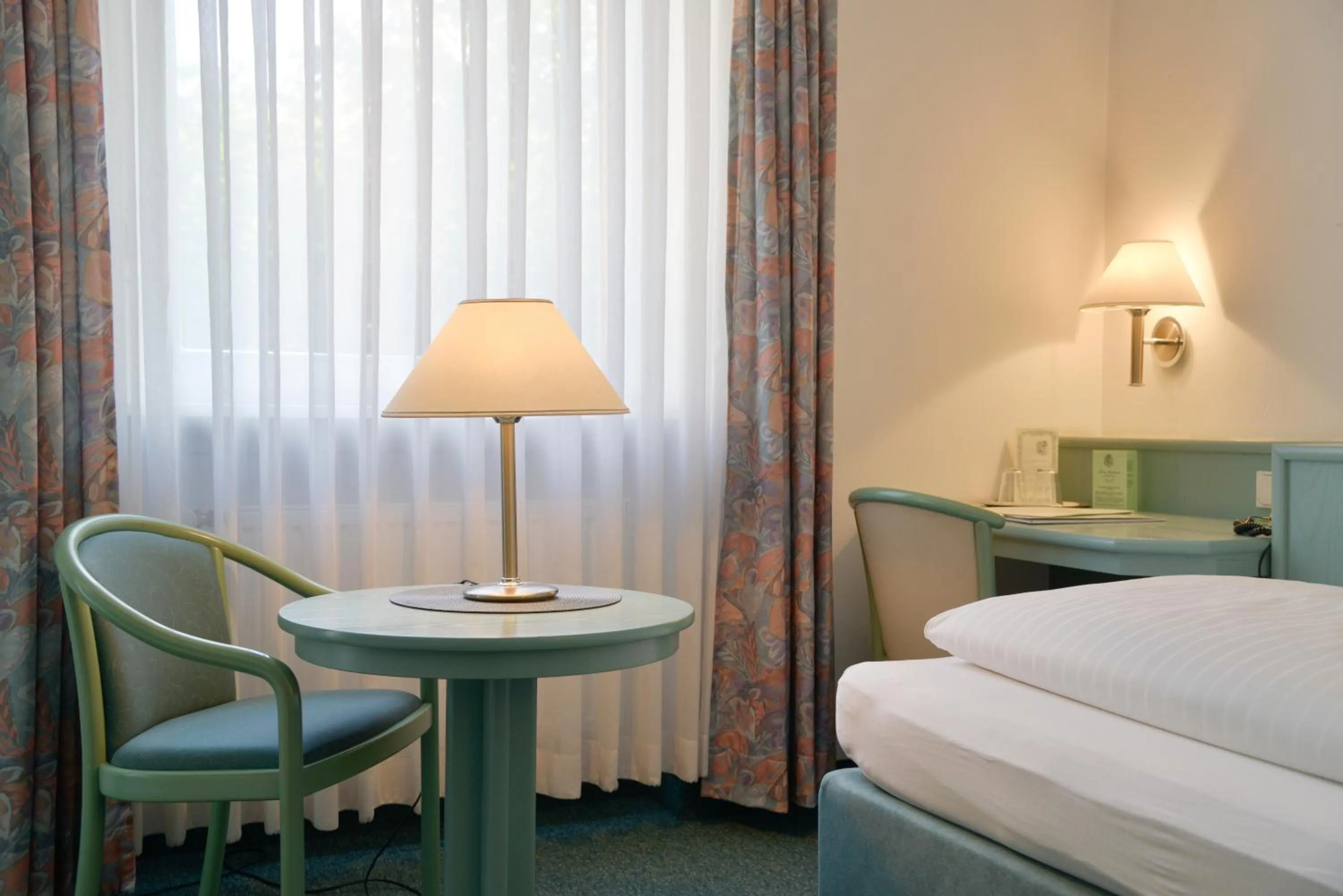 Seating area, Bed in Hotel Till Eulenspiegel - Nichtrauchhotel - Garni