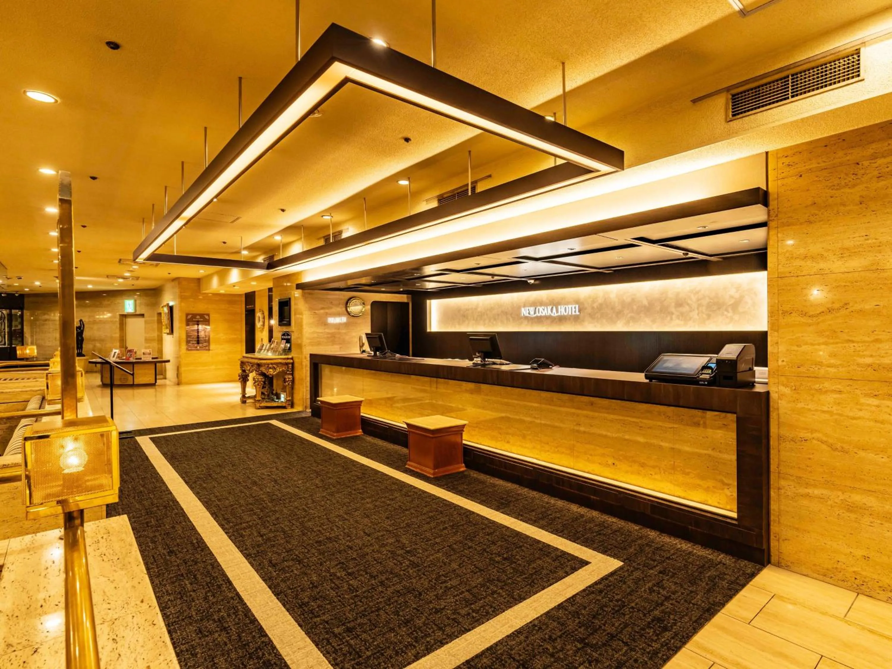 Lobby or reception in New Osaka Hotel