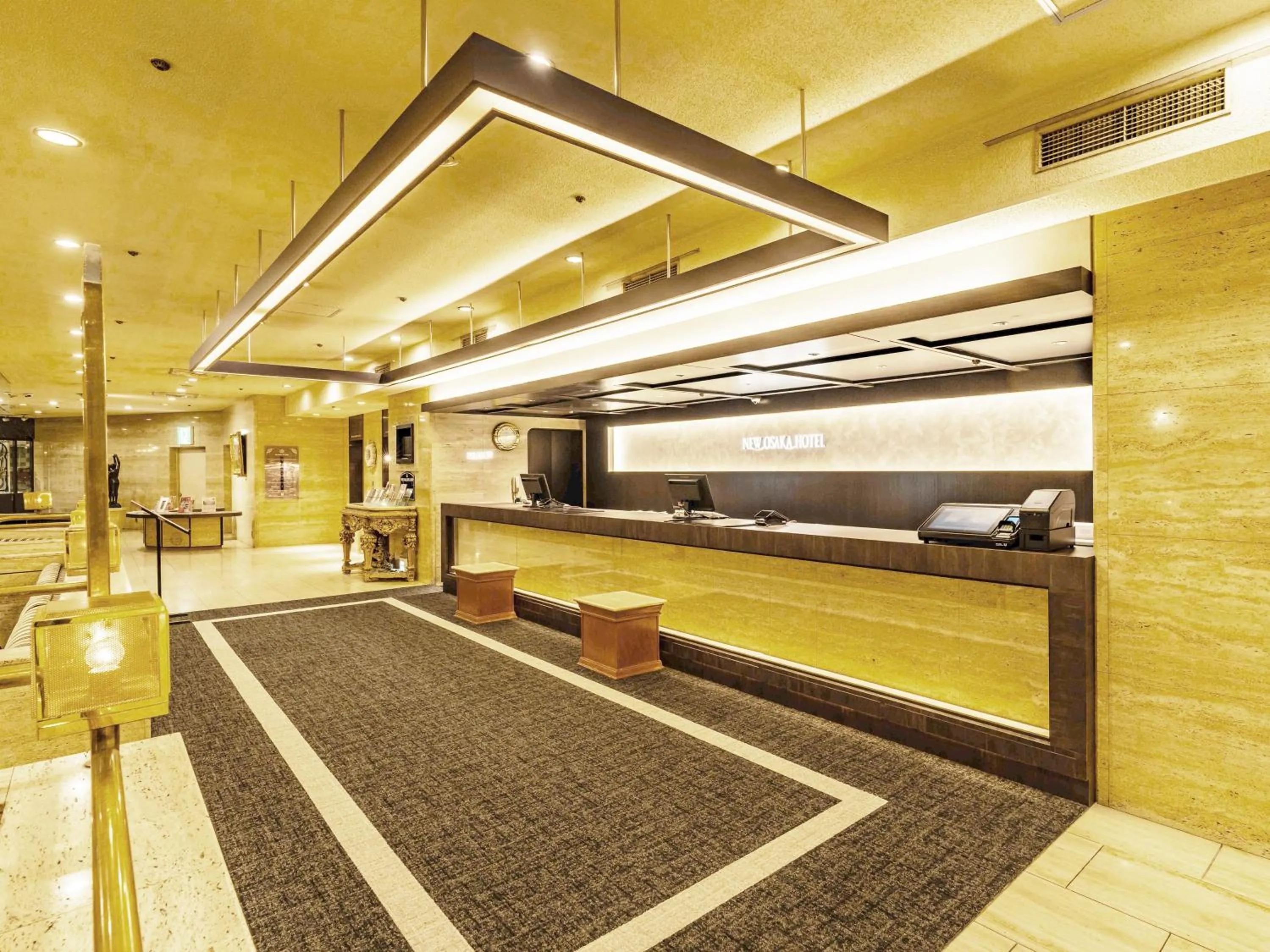 Lobby or reception in New Osaka Hotel