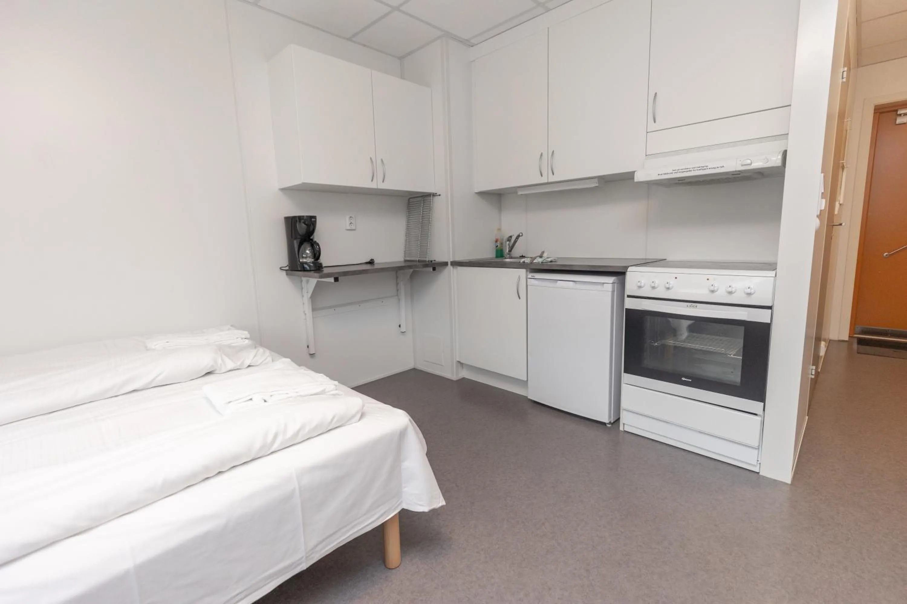 Kitchen or kitchenette, Bed in Ansgar Summerhotel