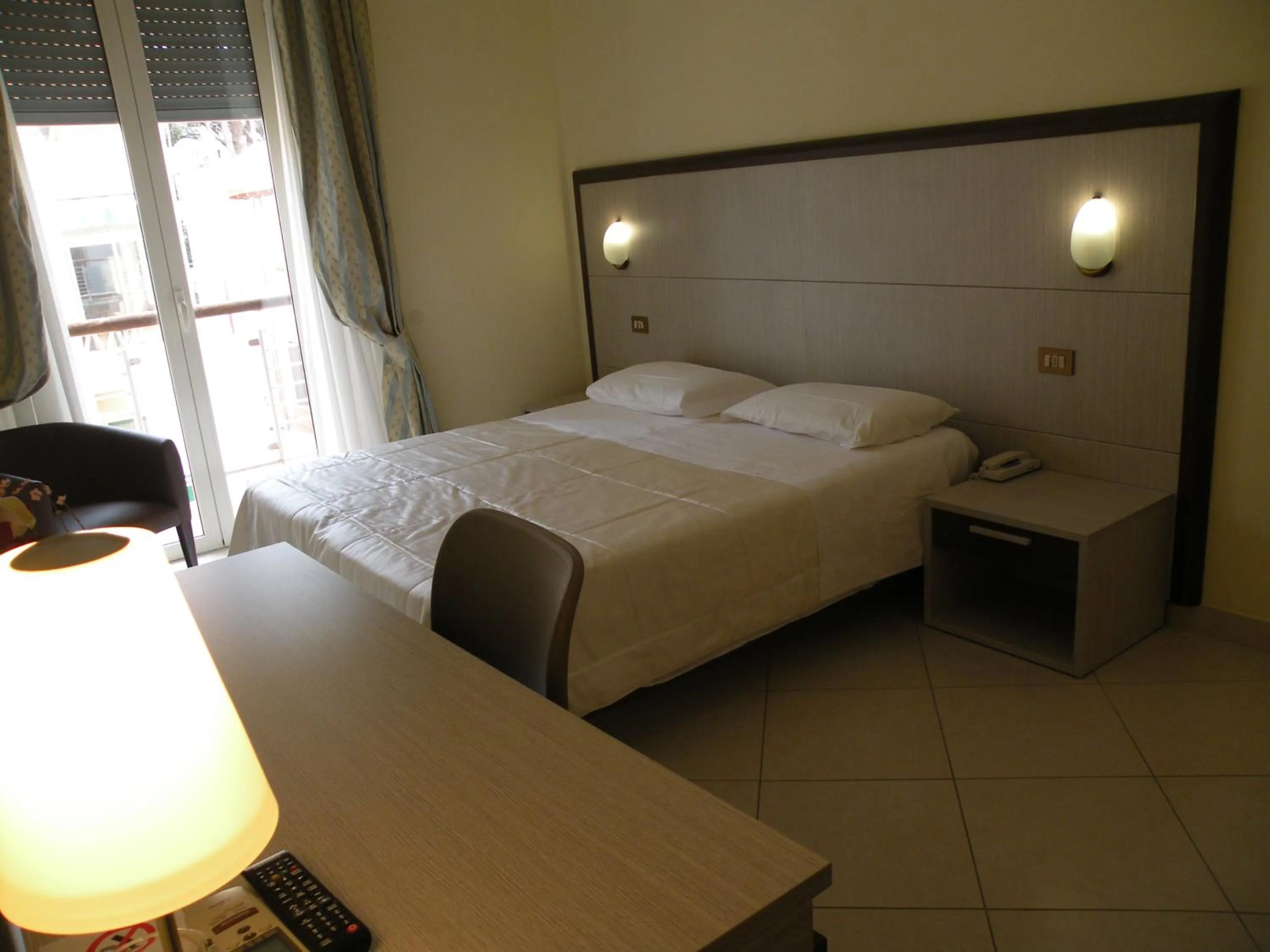 Bed in Hotel Parrini