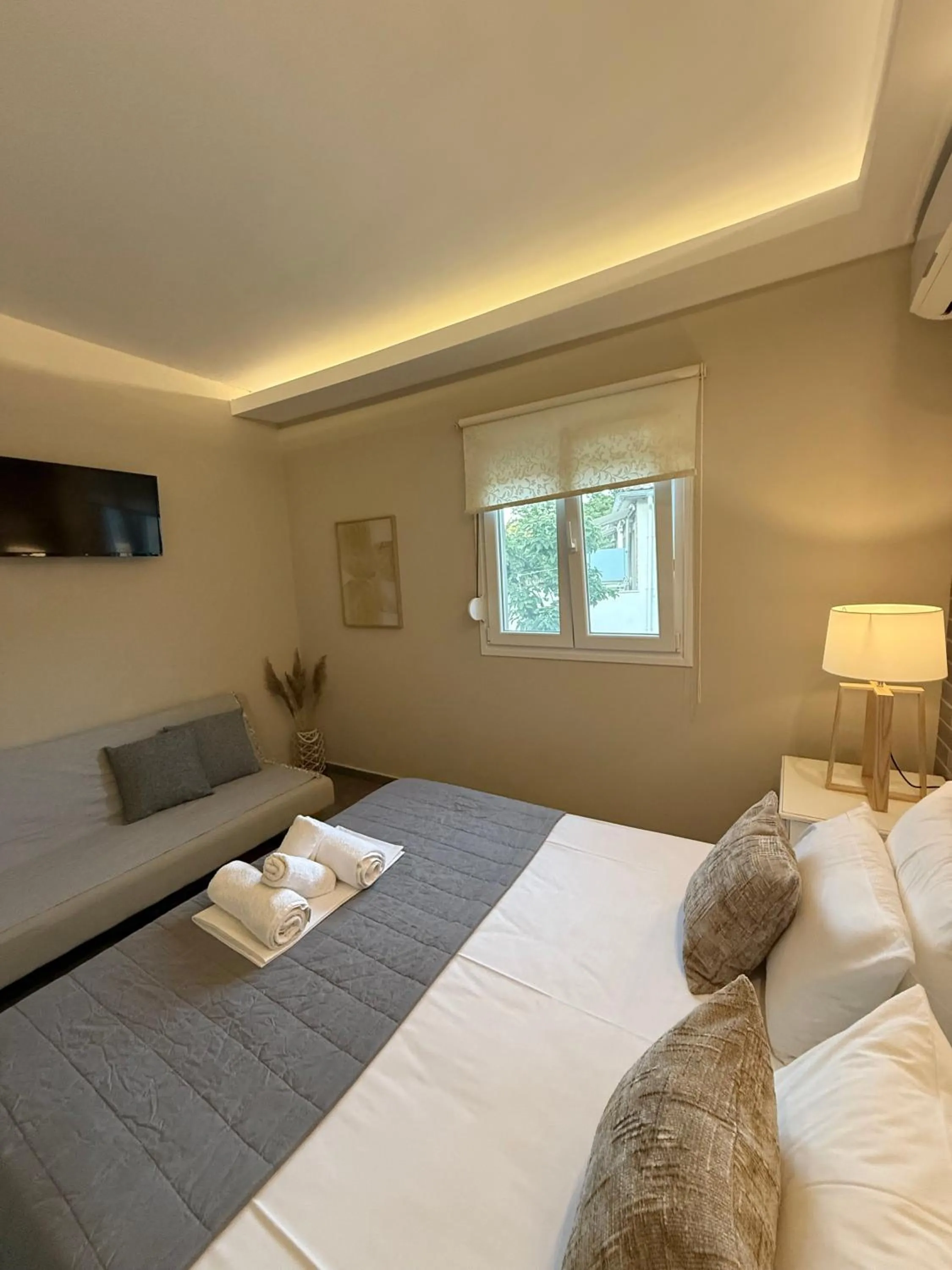 Bed in Aroma Beach Bungalows