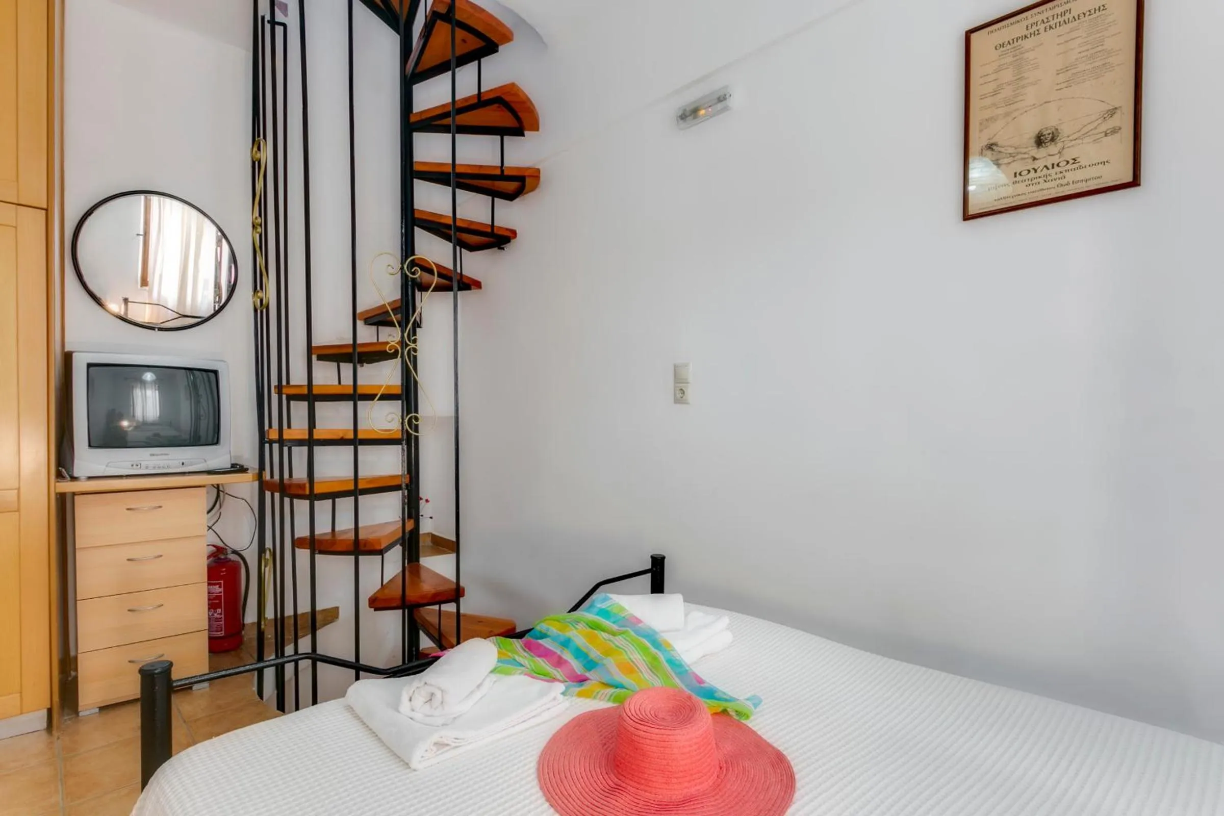 Bed in Ifigenia Rooms