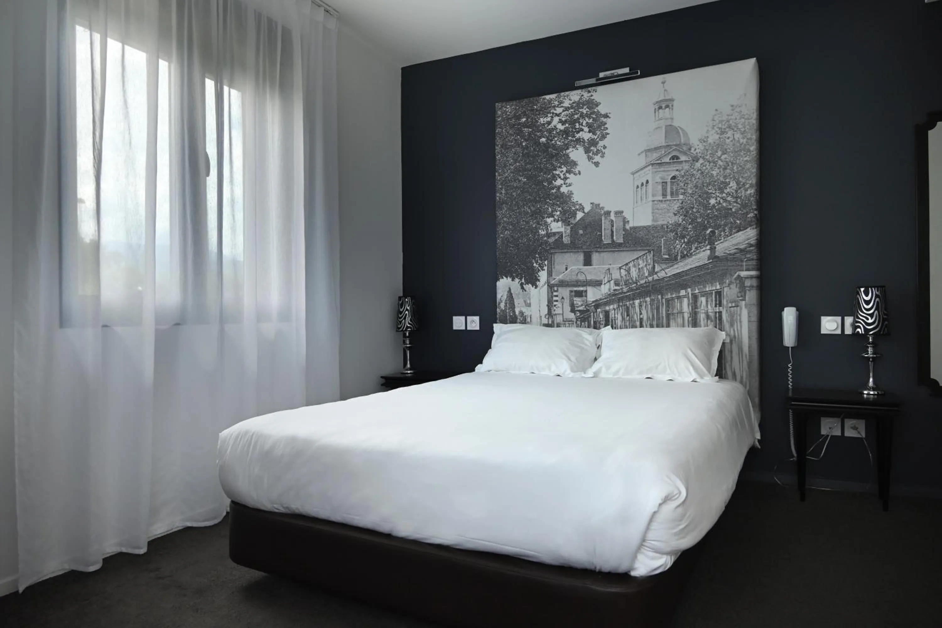 Bed in Hôtel Les Muses