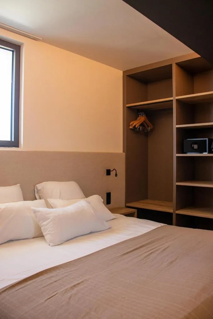 Bed in Hôtel Les Muses