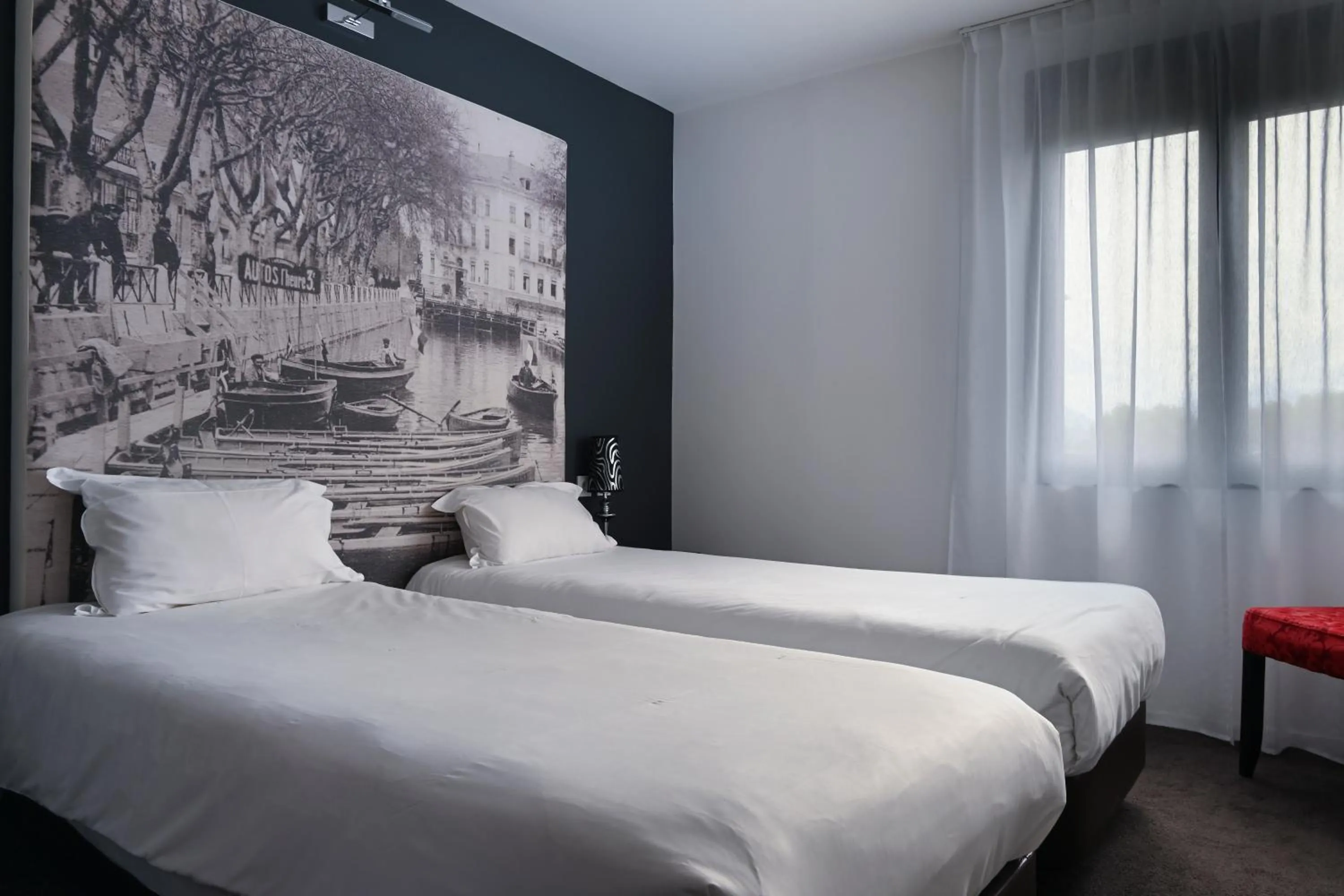 Bed in Hôtel Les Muses
